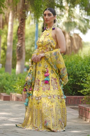 Yellow Halter Neck Lehenga Set with Mirror Embroidery, Tassels & Floral Dupatta
