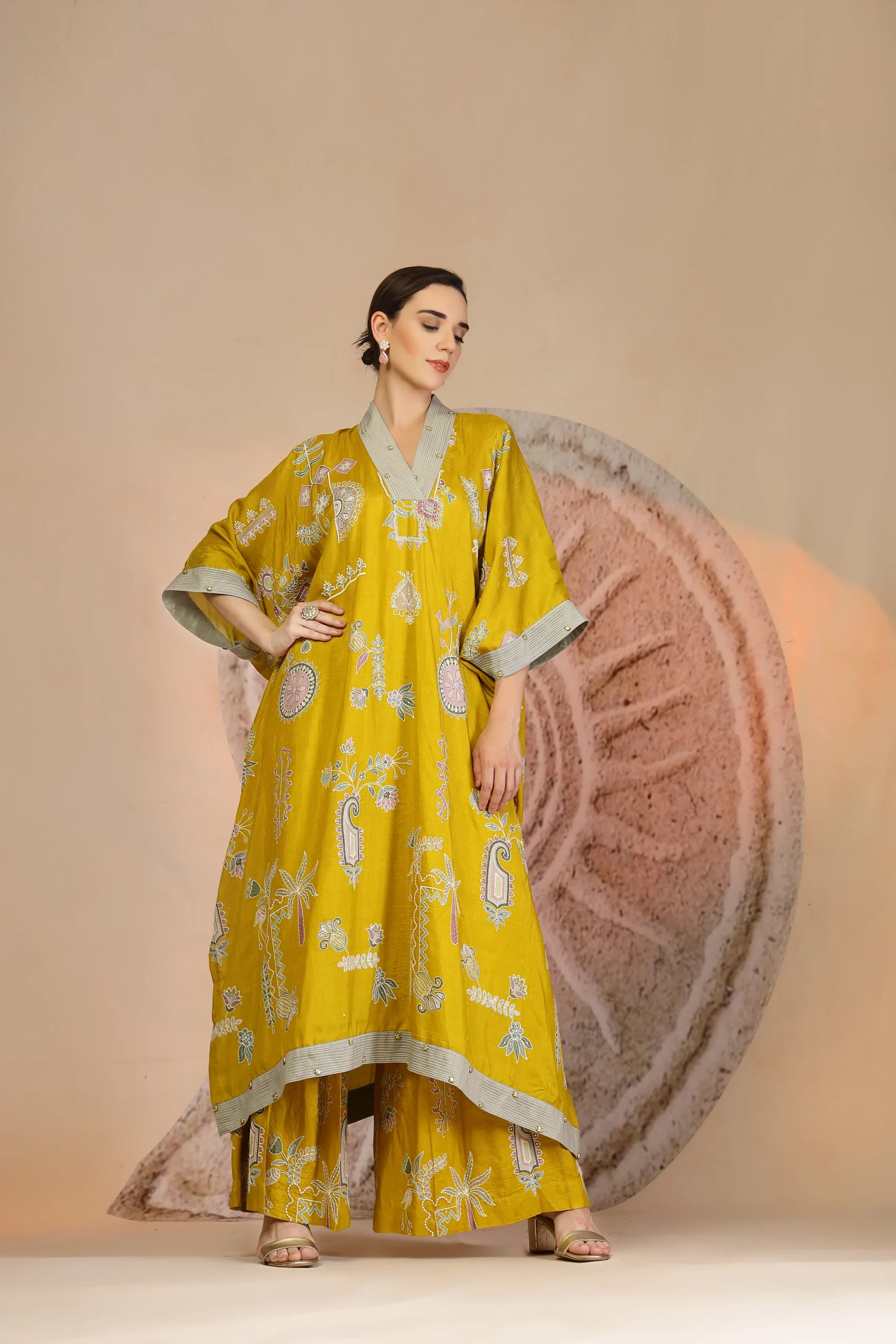 Mustard yellow slub cotton kaftan kurta with wide-leg pants from Golden Muslin By Soniya G
