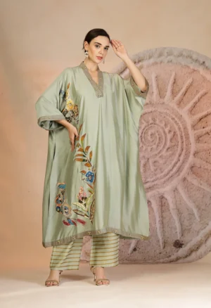 Pista Green Muslin Silk Anti Fit Kurta with Striped Wide Leg Pants from Golden Muslin By Soniya G