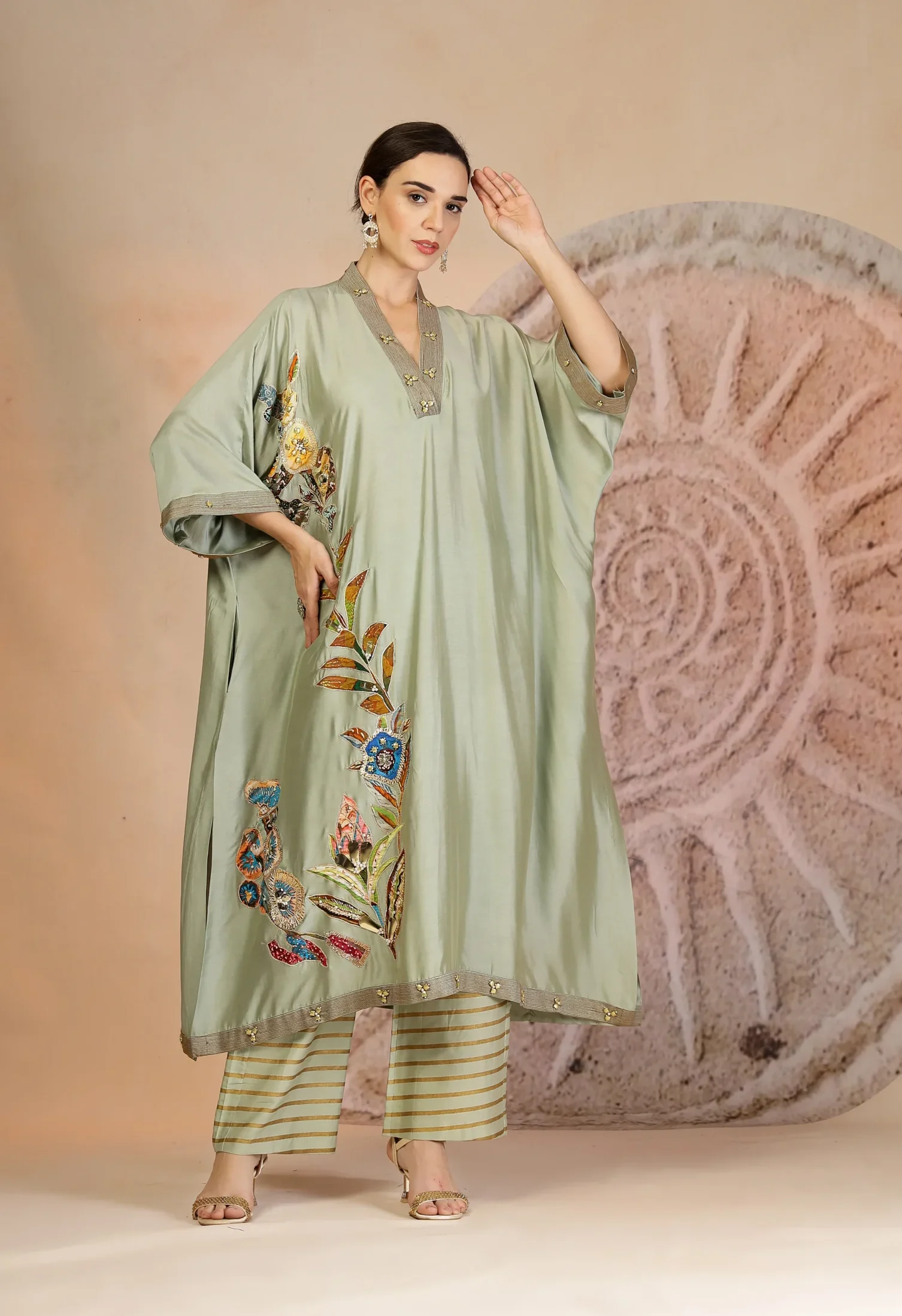 Pista Green Muslin Silk Anti Fit Kurta with Striped Wide Leg Pants from Golden Muslin By Soniya G