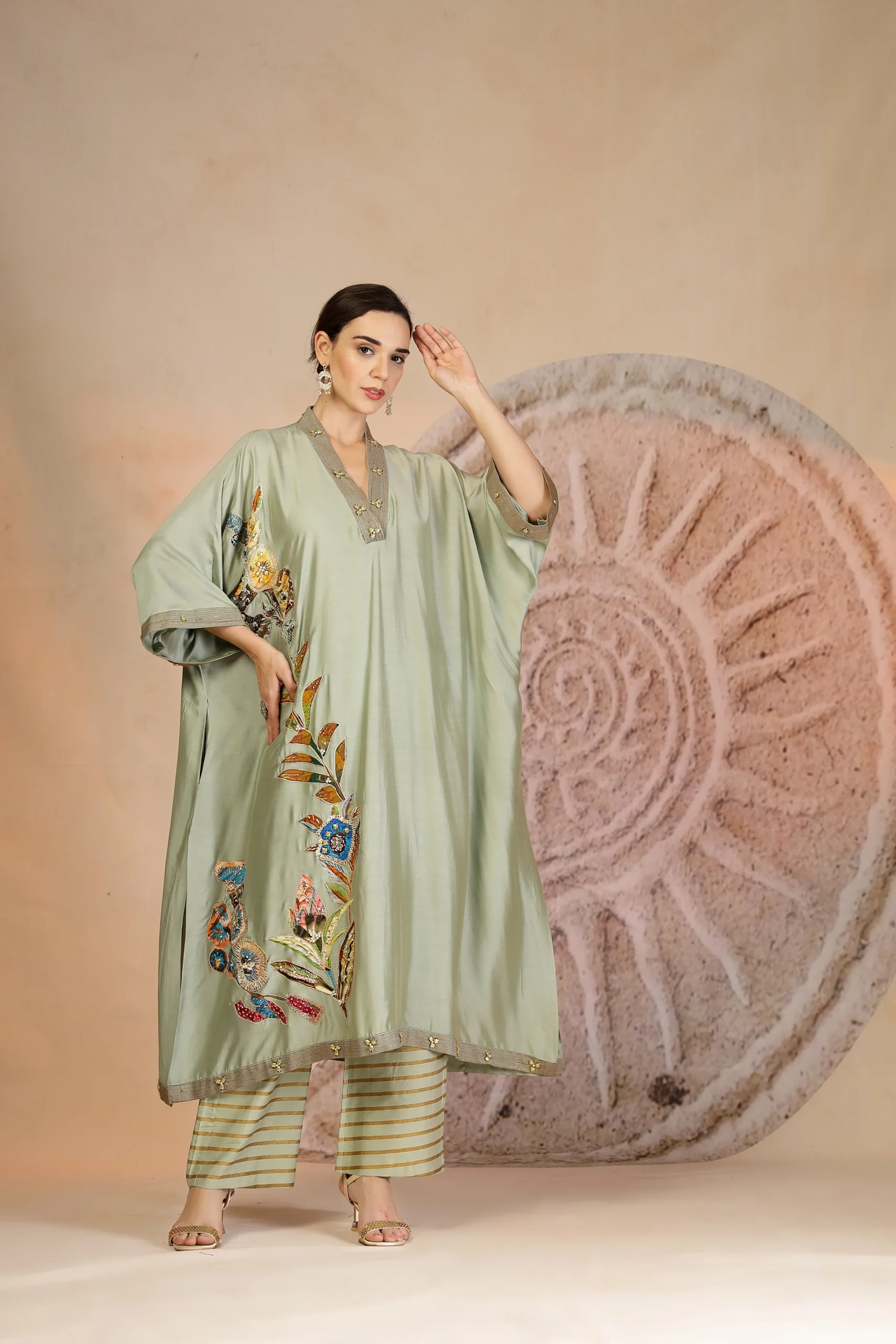 Pista Green Muslin Silk Anti Fit Kurta with Striped Wide Leg Pants from Golden Muslin By Soniya G