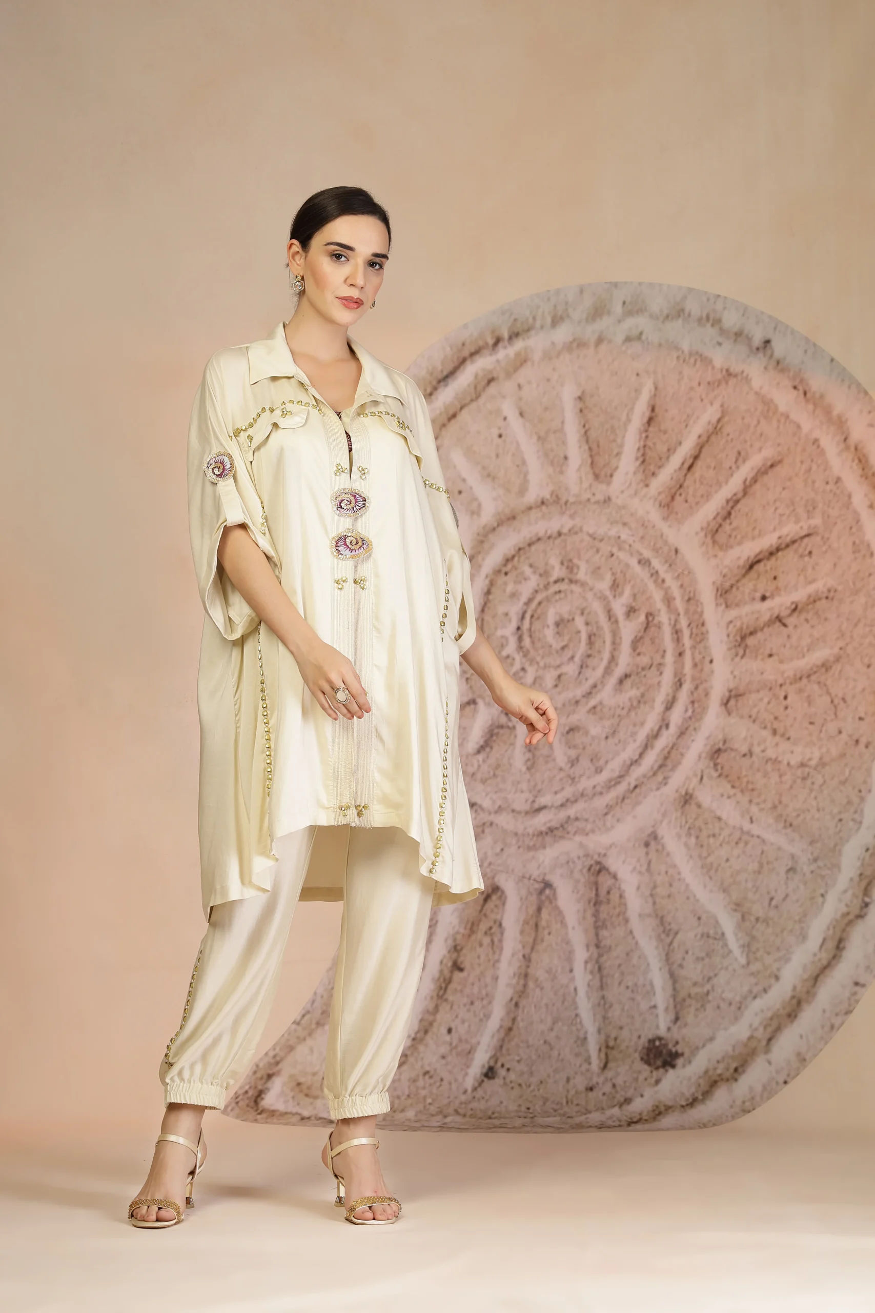 Ivory Muslin Silk Indo Western Layered Kurta with Patchwork Shrug from Golden Muslin By Soniya G