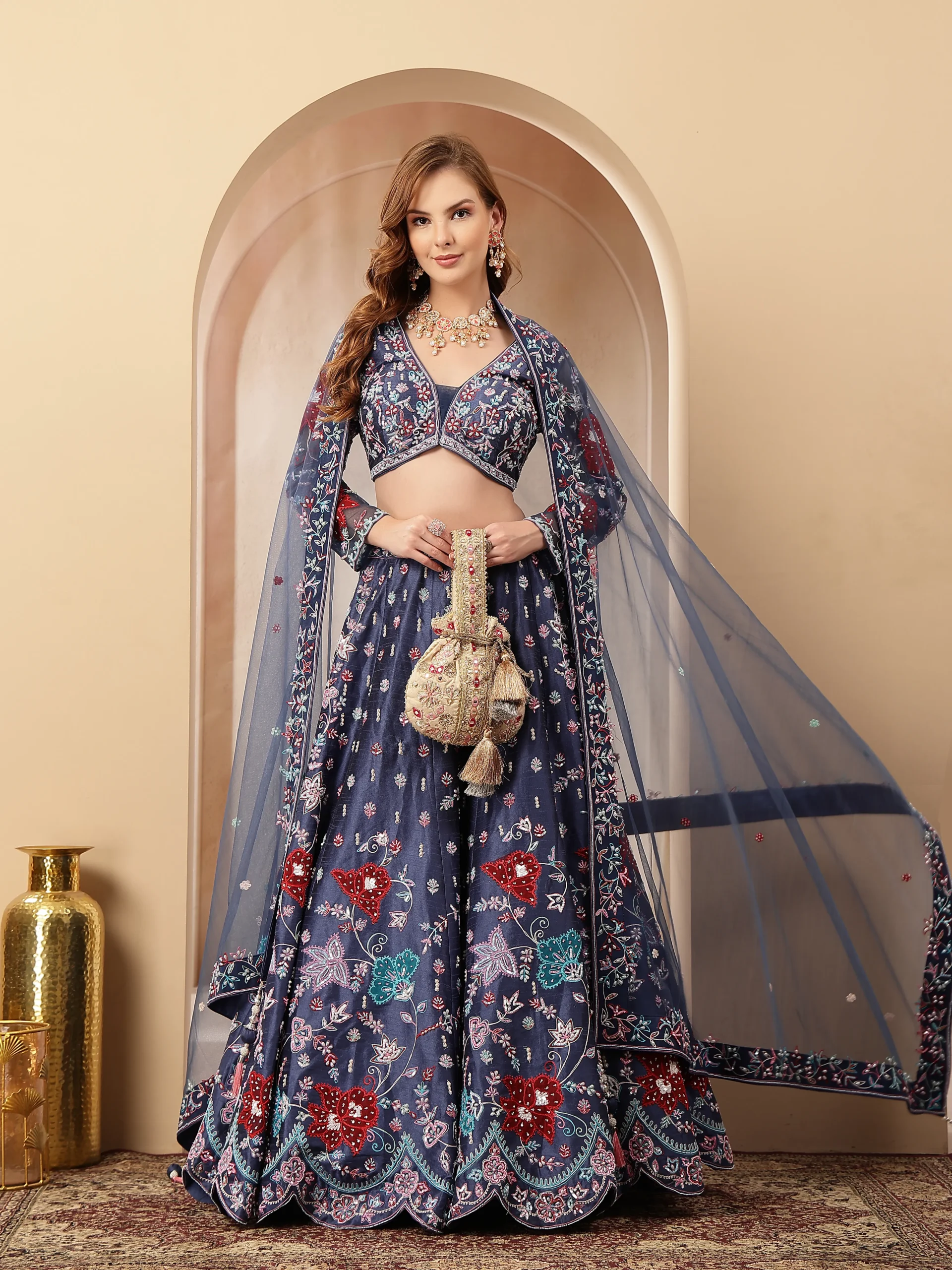 Navy blue printed silk lehenga with embroidered blouse from Golden Muslin By Soniya G