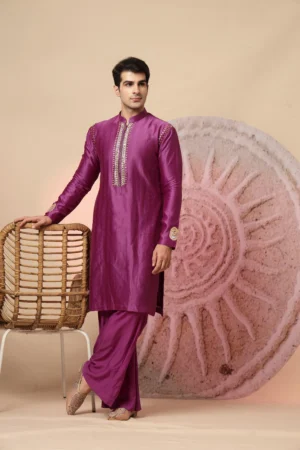 Magenta Silk Blend Kurta Pajama Set with Mirror Work from Golden Muslin By Soniya G featuring mandarin collar and festive detailing