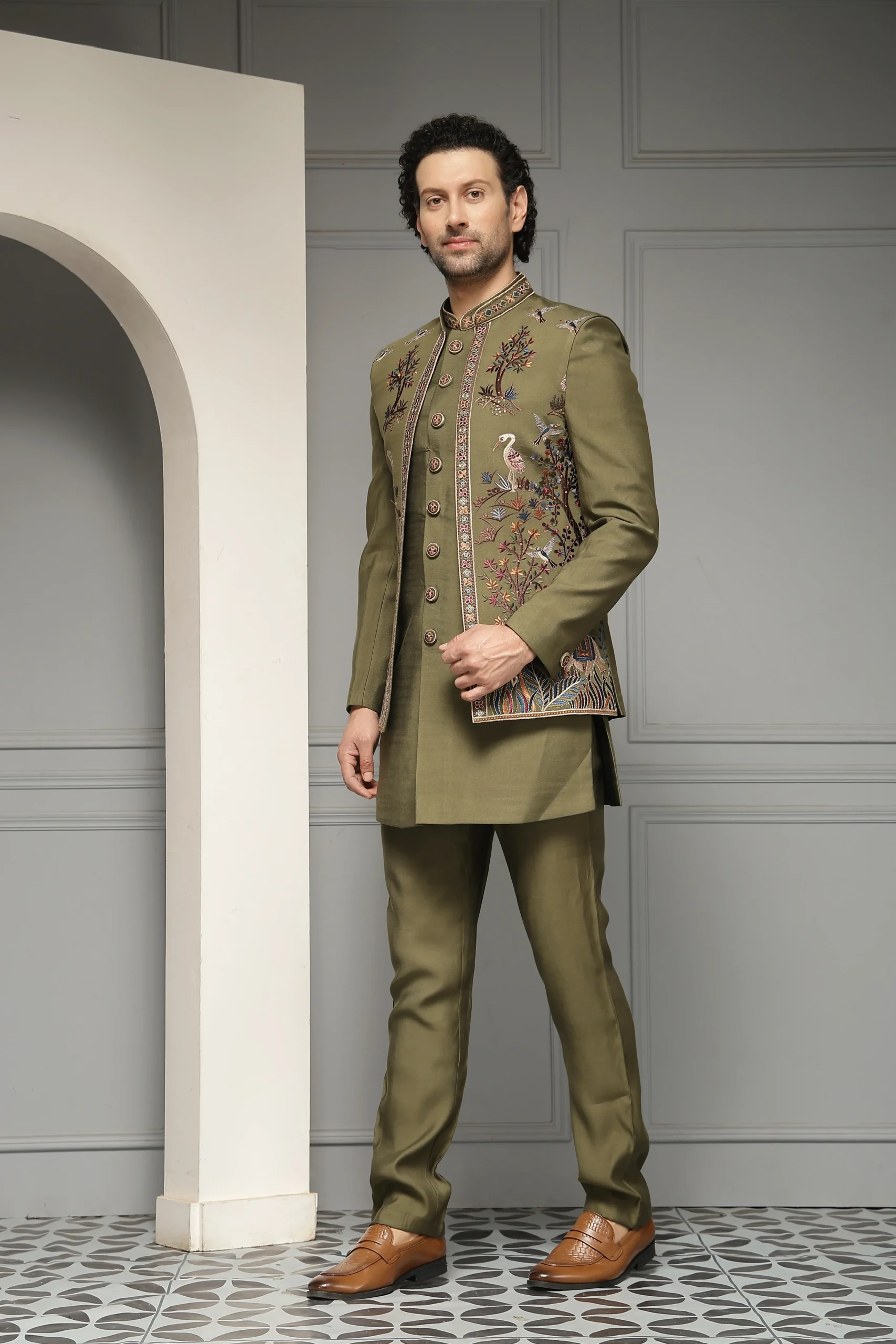 Olive green embroidered bandhgala jacket with tailored trousers from Golden Muslin By Soniya G