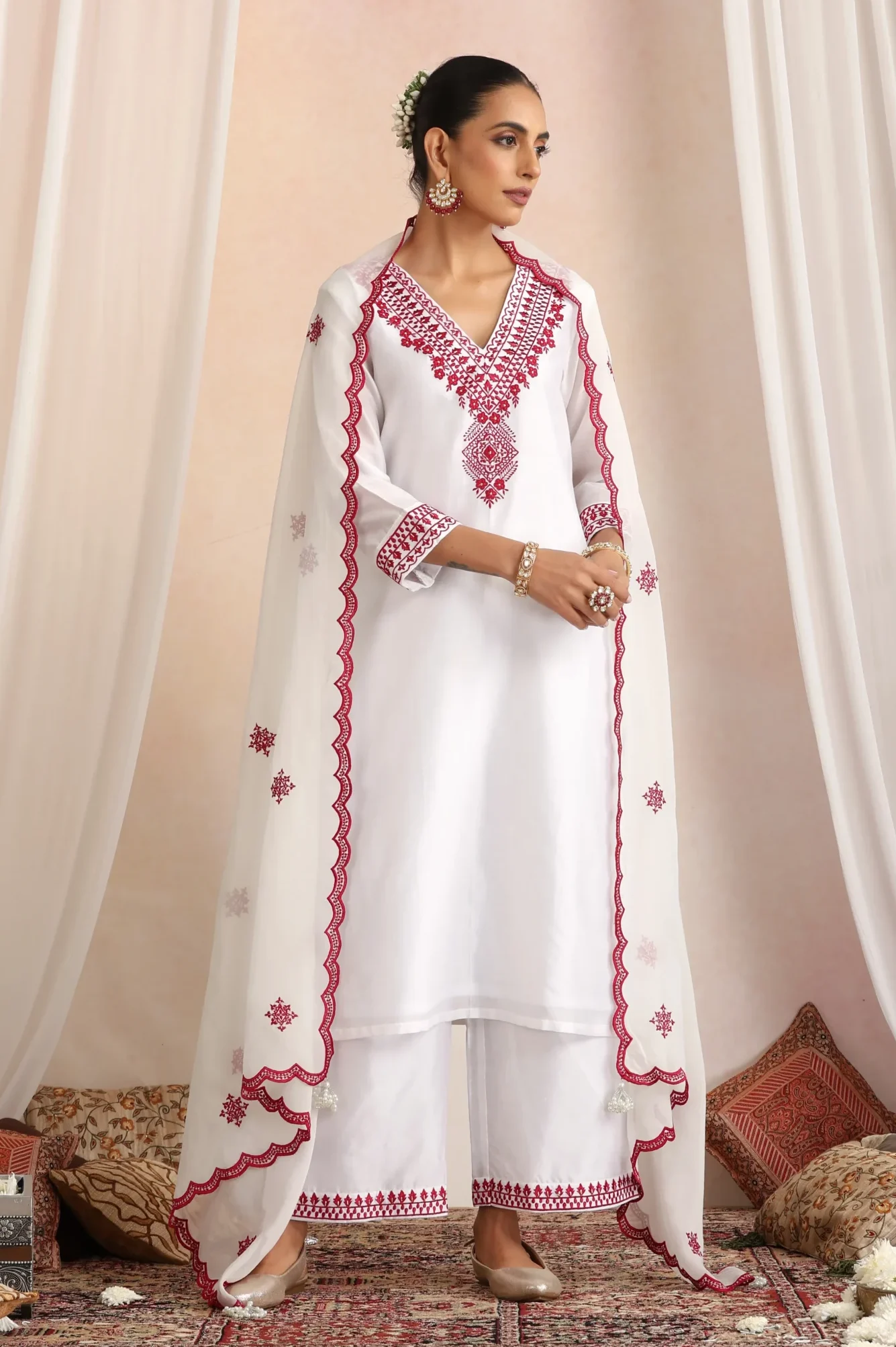 Elegant white ethnic kurta set with pink accents and dupatta from Golden Muslin By Suikala