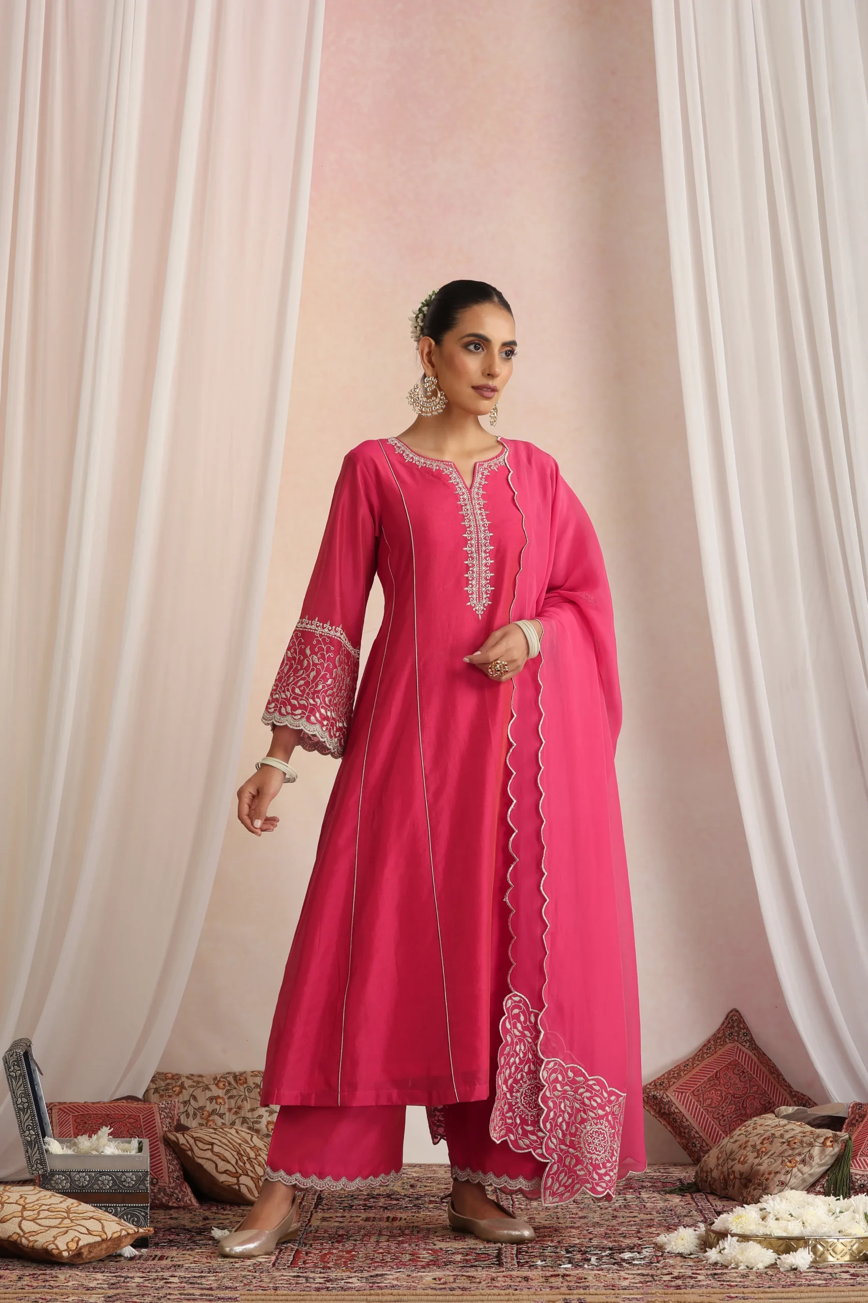 Deep pink flowy ethnic kurta set with dupatta from Golden Muslin By Suikala