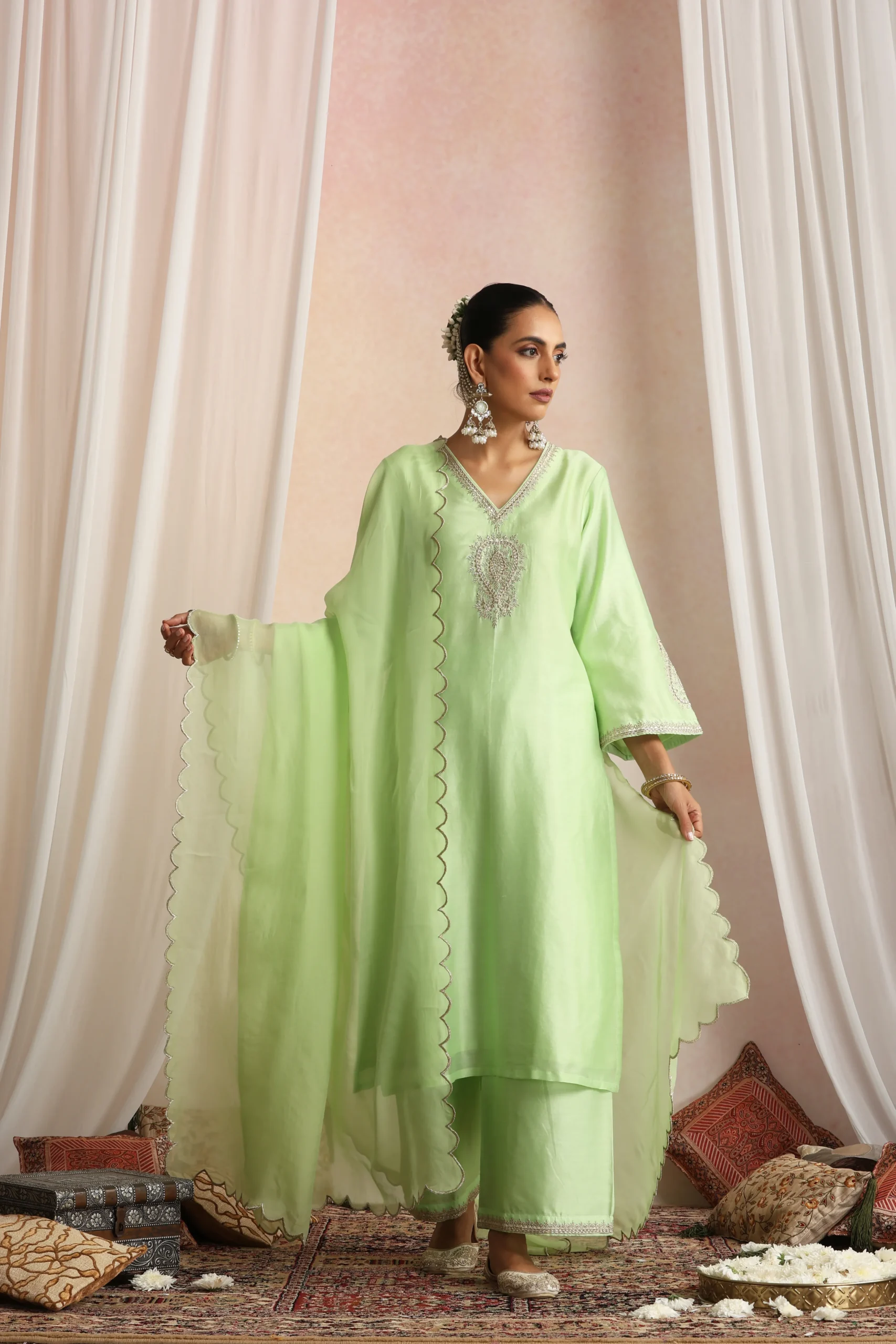 Pastel green flowy ethnic kurta set with dupatta from Golden Muslin By Suikala