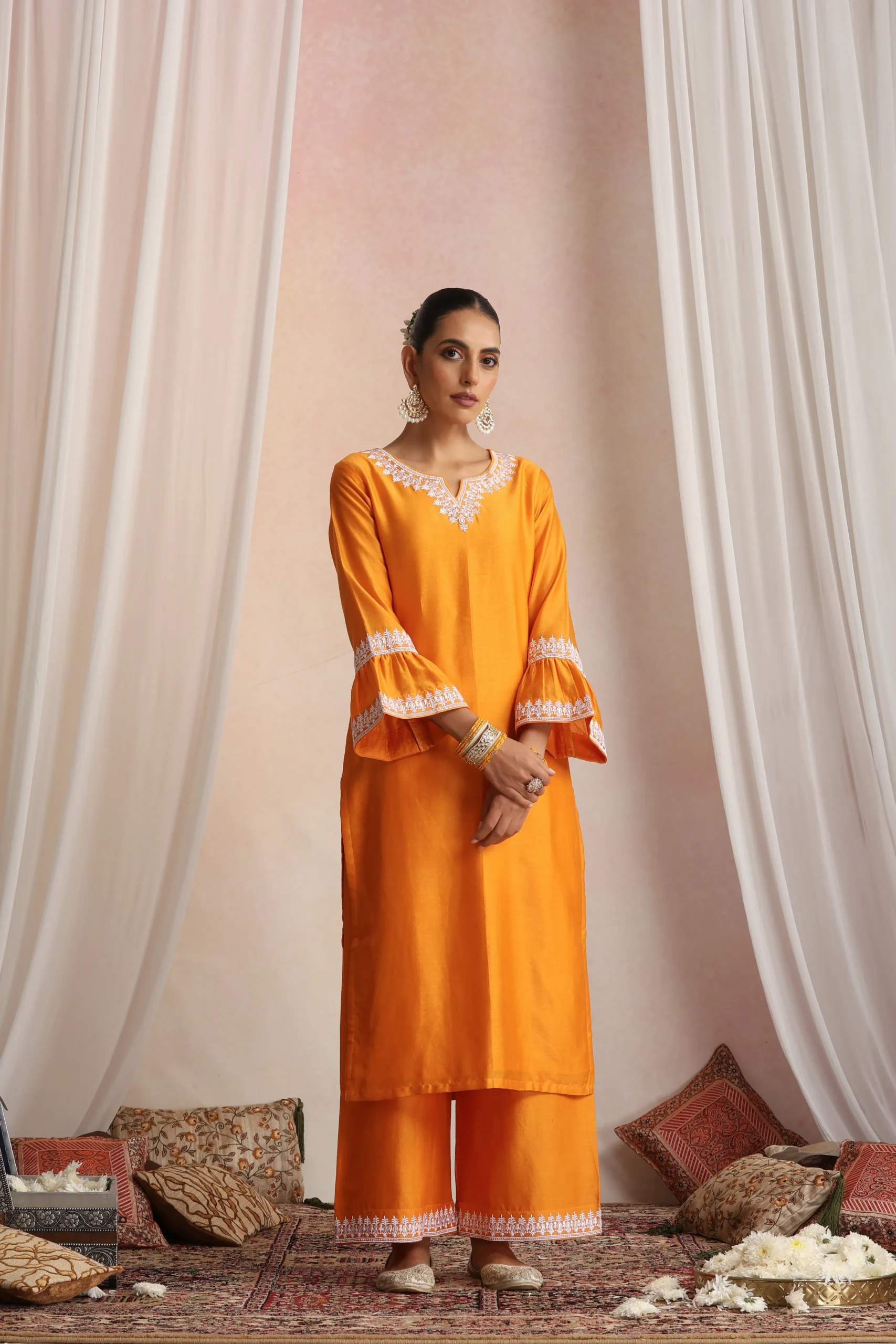 Vibrant orange straight ethnic kurta set from Golden Muslin By Suikala