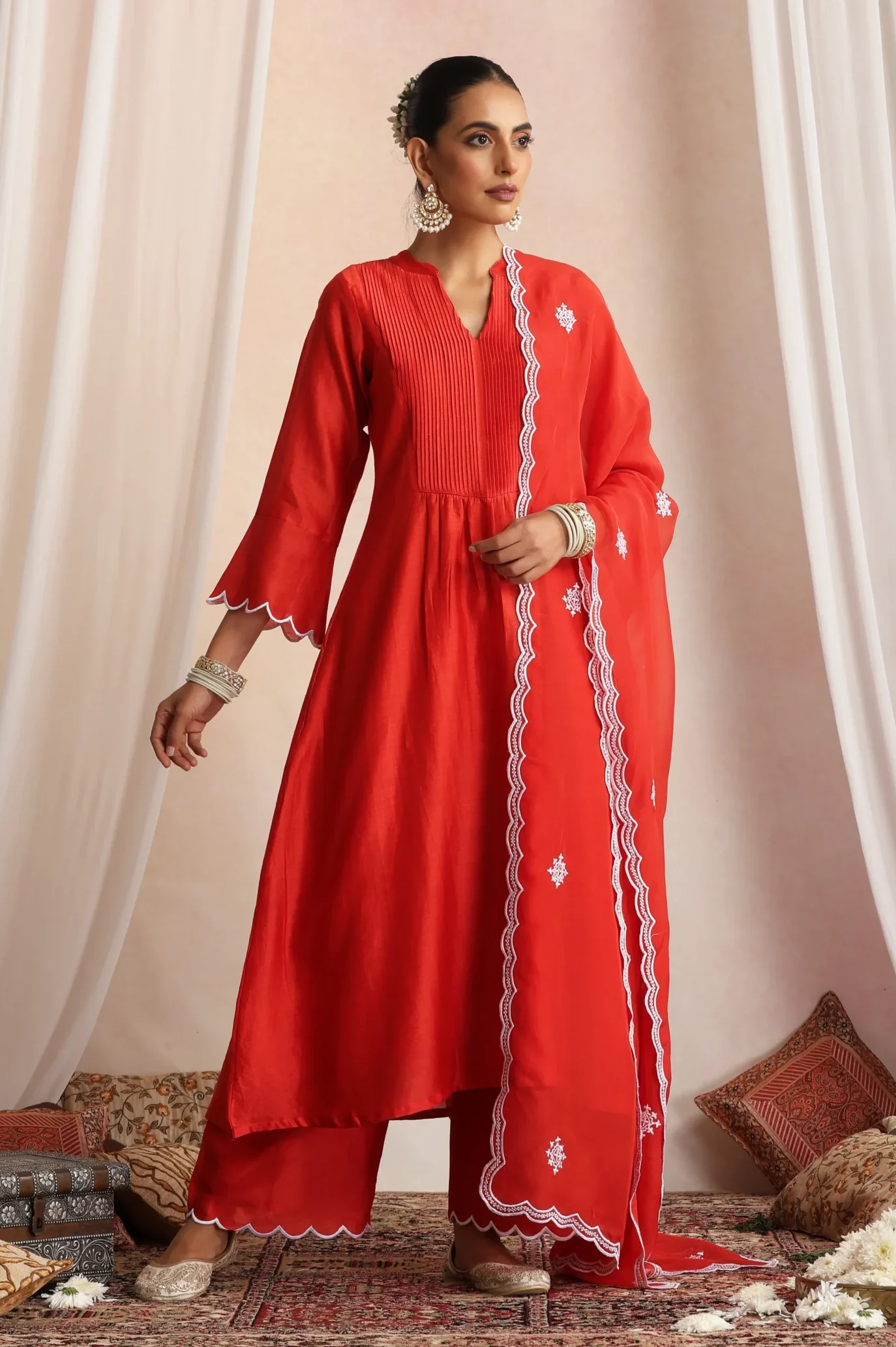 Stunning red flowy ethnic kurta set with dupatta from Golden Muslin By Suikala