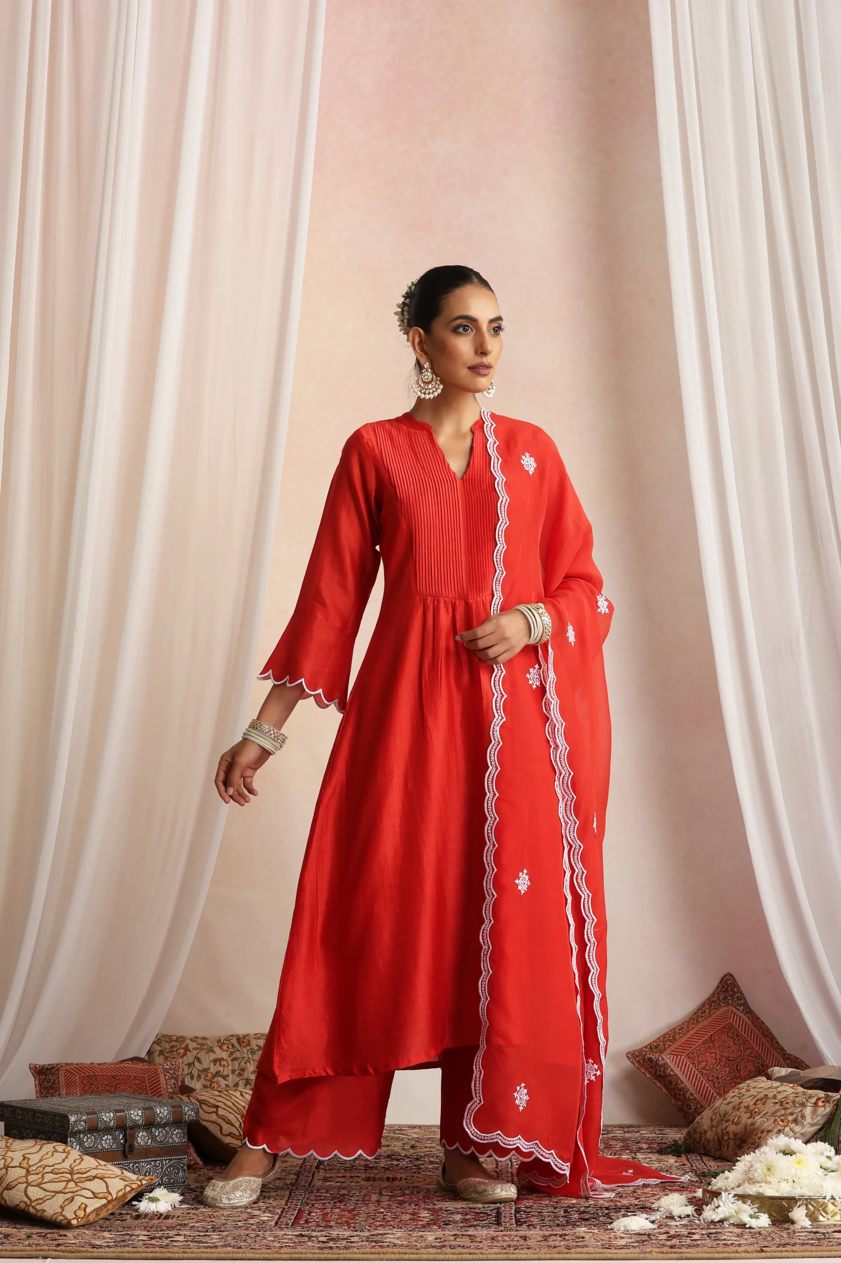 Stunning red flowy ethnic kurta set with dupatta from Golden Muslin By Suikala