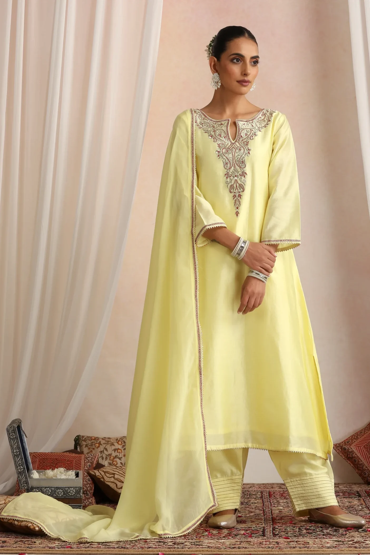 Pastel yellow ethnic kurta set with silver embroidered yoke from Golden Muslin By Suikala