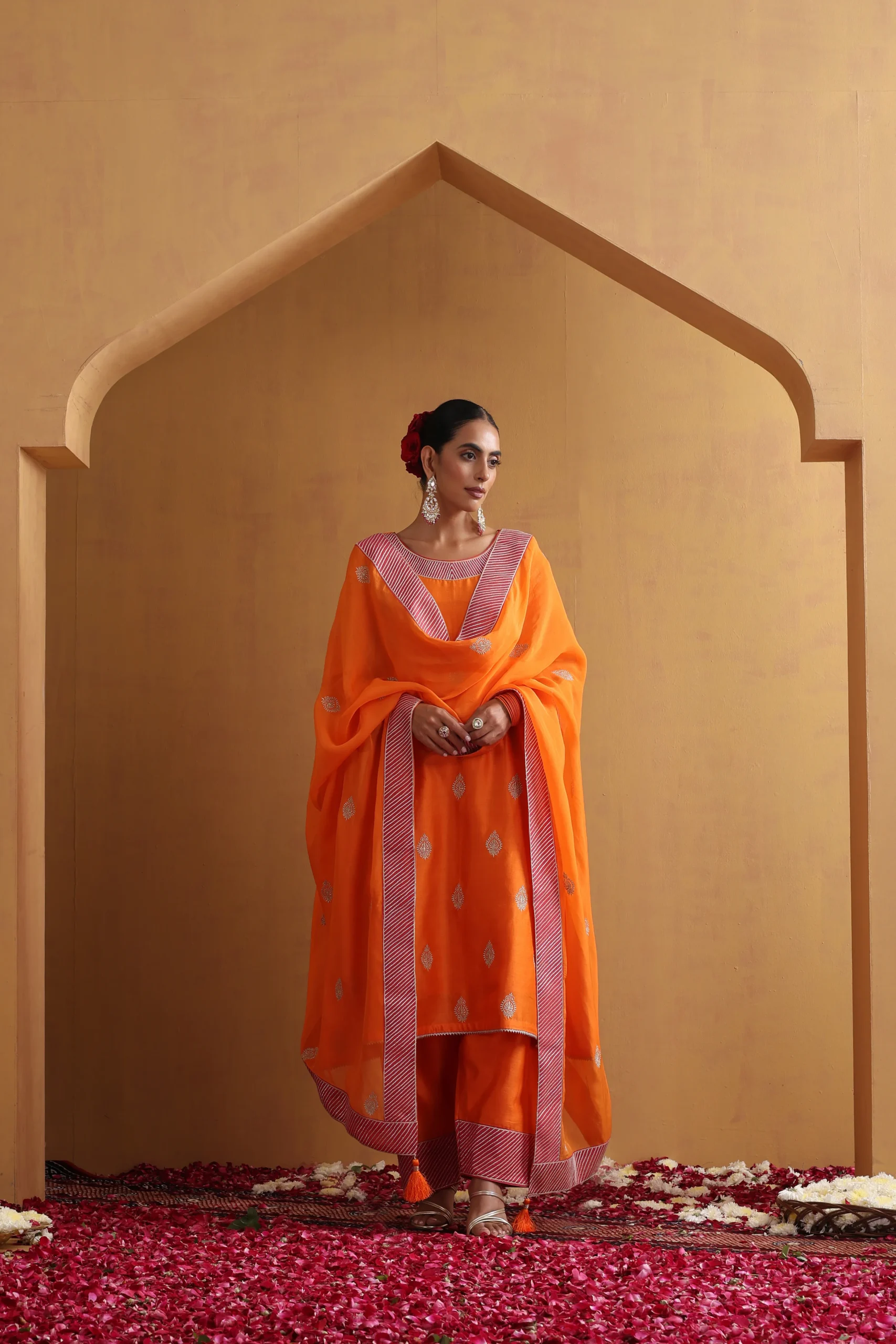 Vibrant orange embroidered ethnic suit set with dupatta from Golden Muslin By Suikala