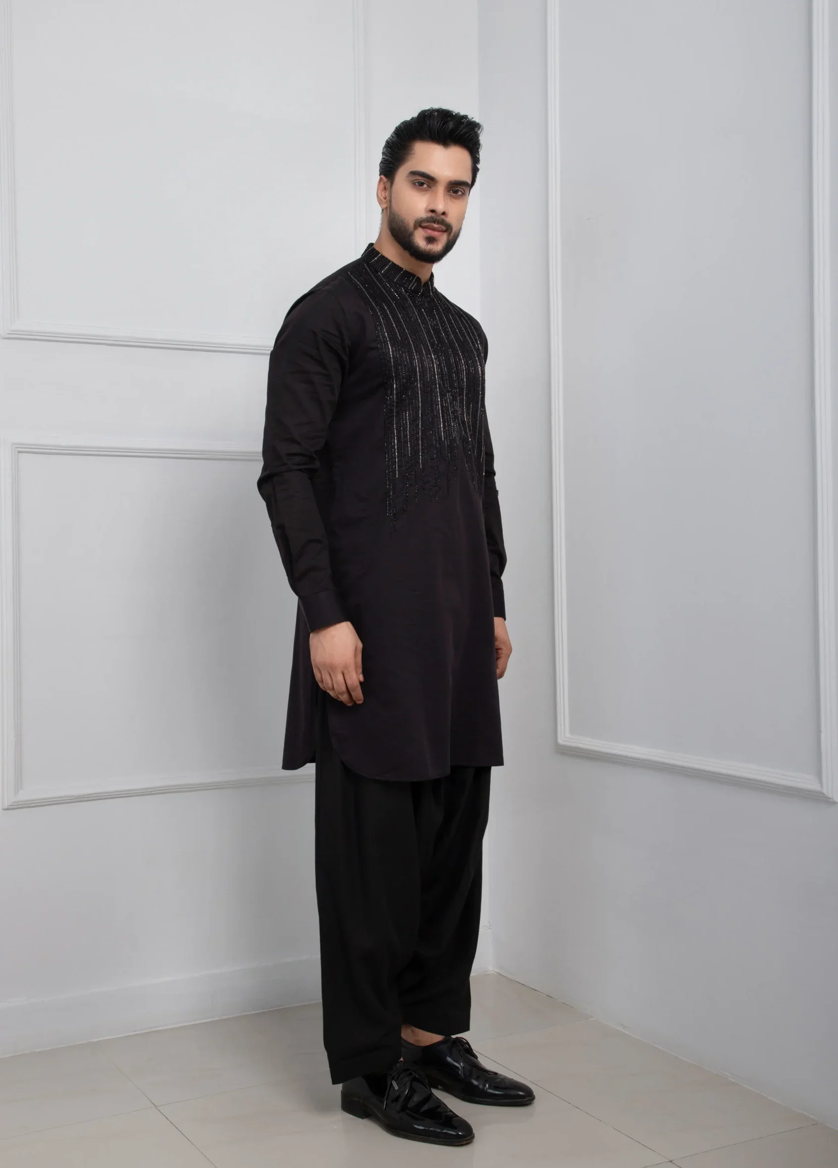 Black Embroidered Pathani Kurta Set with Patiala Salwar from Golden Muslin By Anuj Agarwal