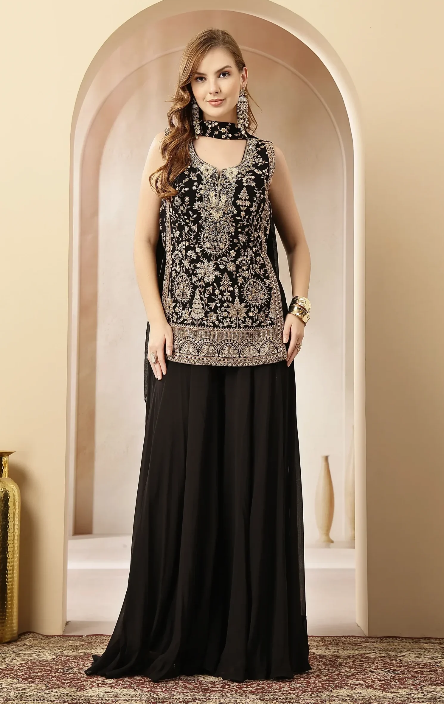 Black velvet kurta set with silver zari and sequin embroidery from Golden Muslin By Soniya G