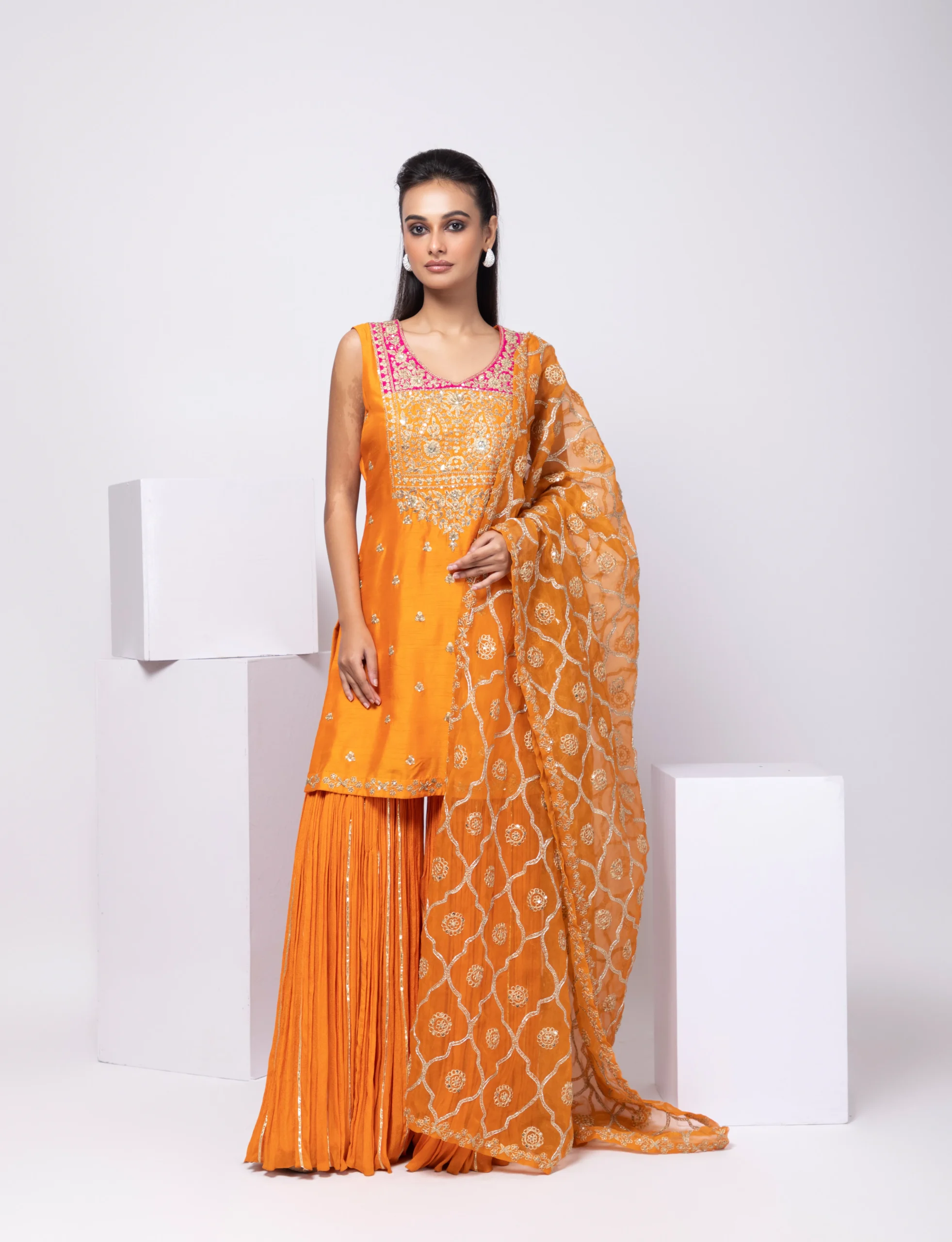 Golden Muslin Sunset Bloom Orange Embroidered Sharara Kurta Set with pleated sharara and sheer dupatta