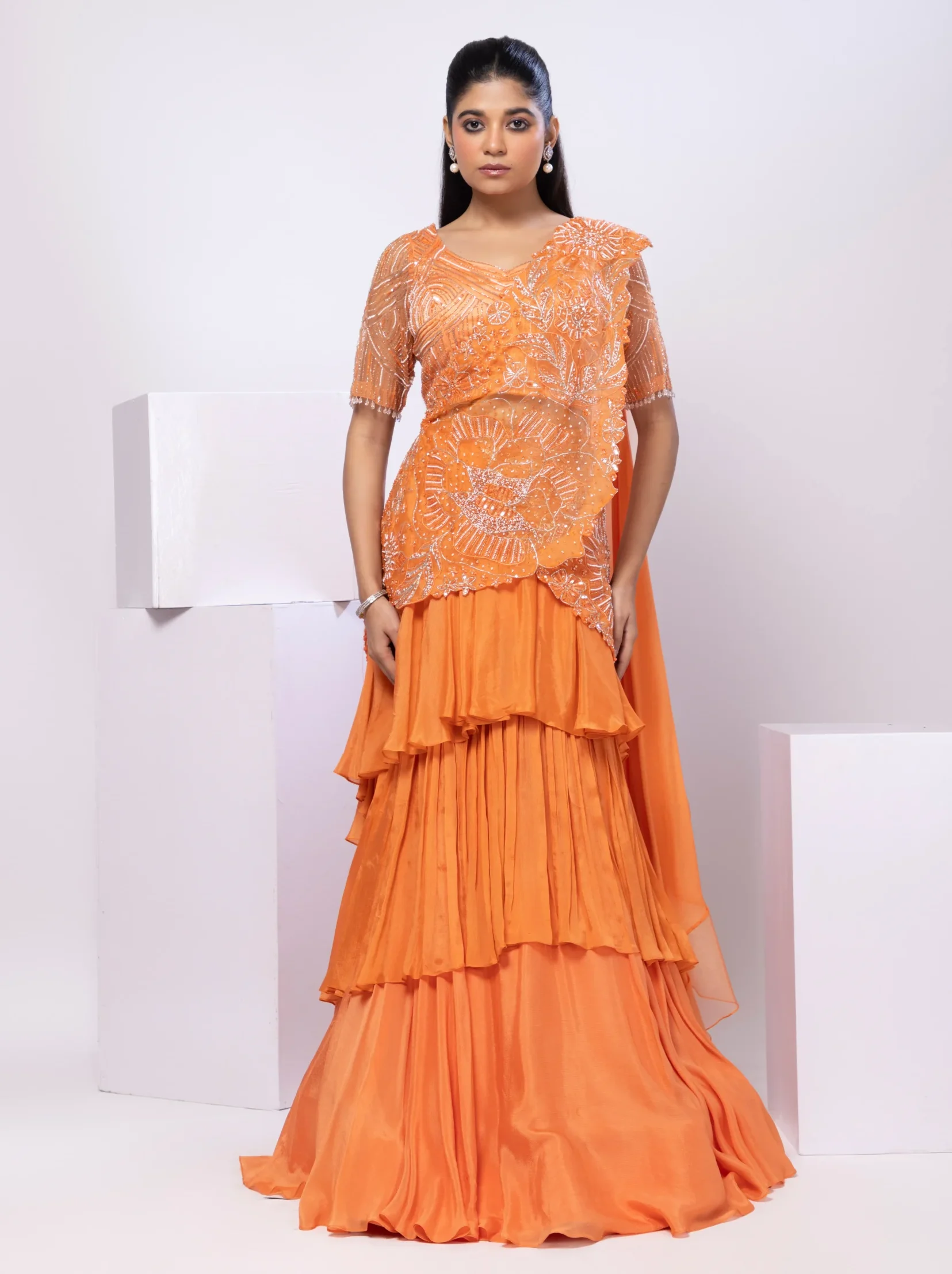 Crystal Orange Lehenga Set with Silver Embroidery from Golden Muslin By Anuj Agarwal