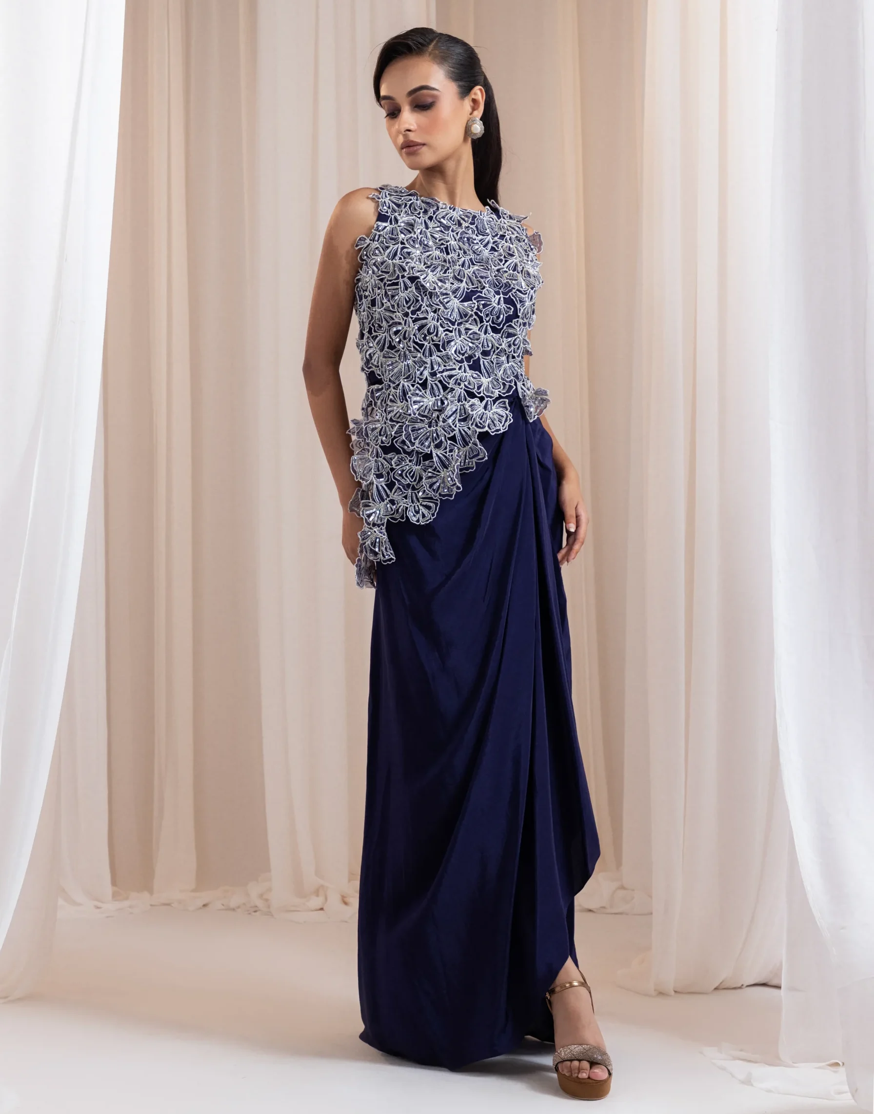 Deep indigo 3D floral embroidered top with draped skirt from Golden Muslin By Anuj Agarwal