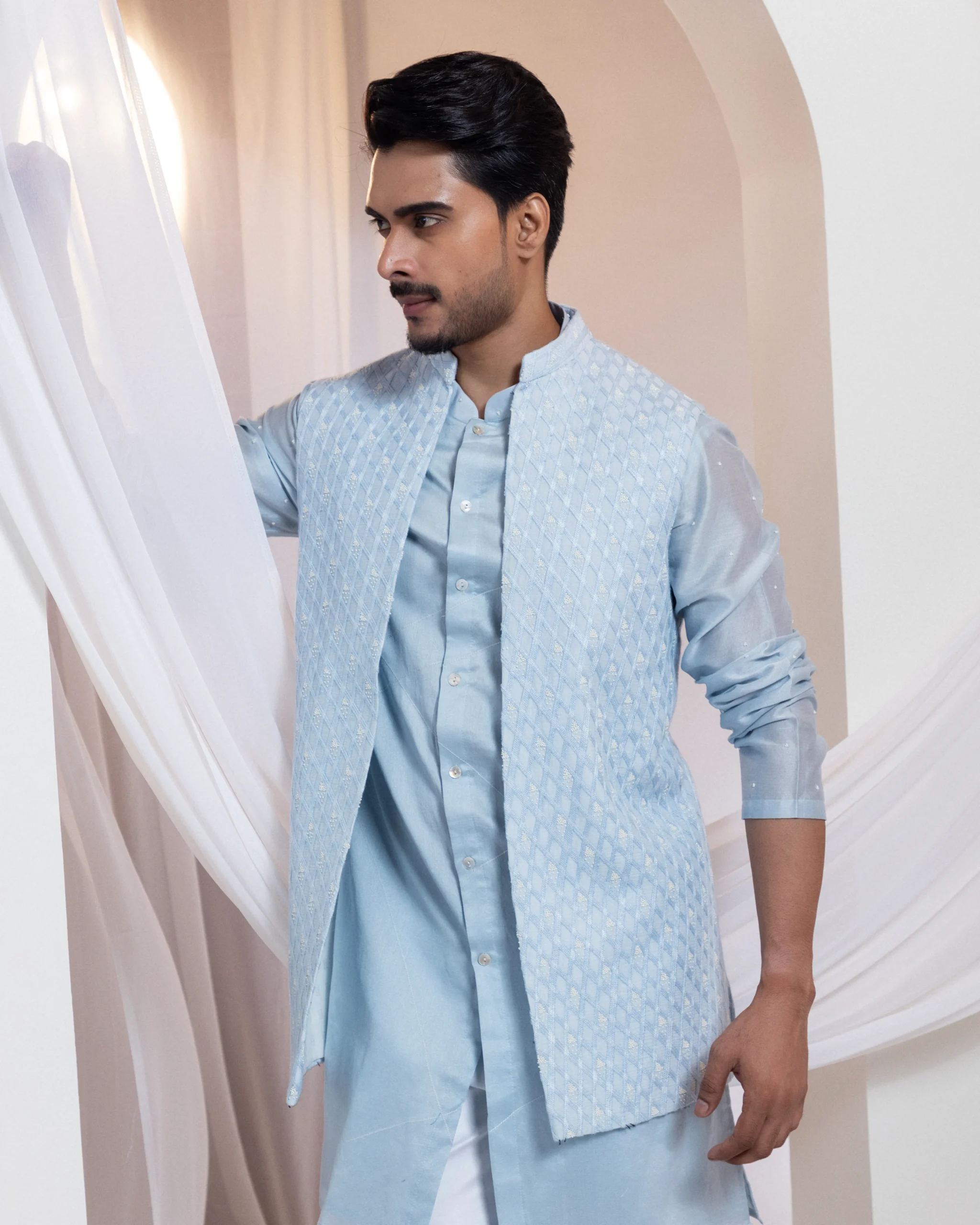 Powder blue Nehru jacket with diamond textured embroidery from Golden Muslin By Anuj Agarwal