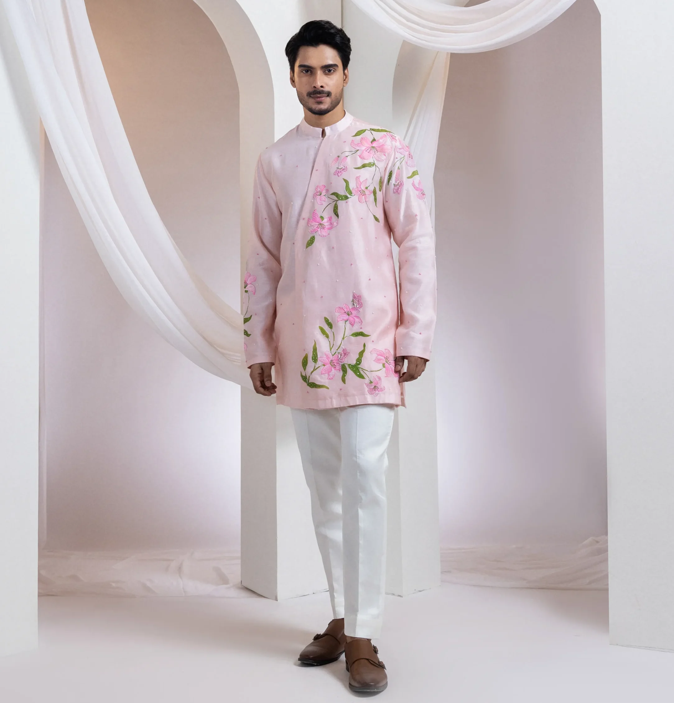 Hand-painted floral two-piece kurta set with pink embroidery and bead detailing from Golden Muslin By Anuj Agarwal