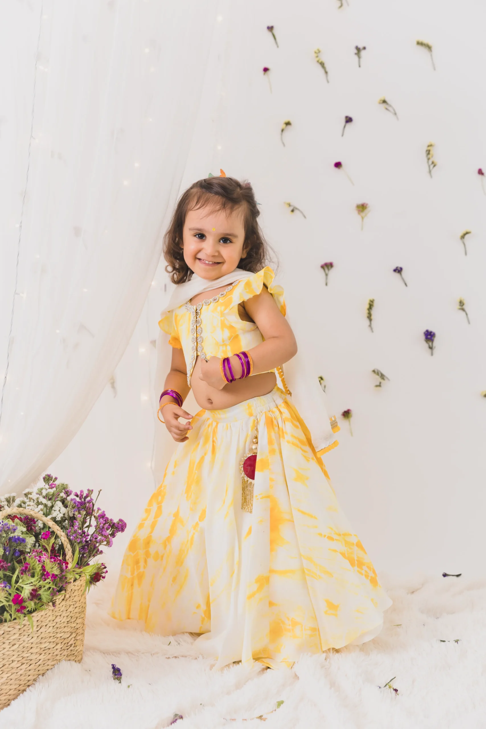 Yellow Ivory Haldi Tie and Dye Silk Lehenga Set festive outfit from Golden Muslin By Choti Buti