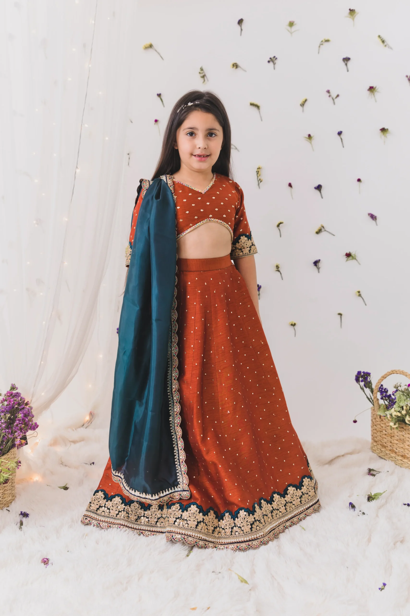 Rust Silk Lehenga Set with Contrast Dupatta festive outfit from Golden Muslin By Choti Buti