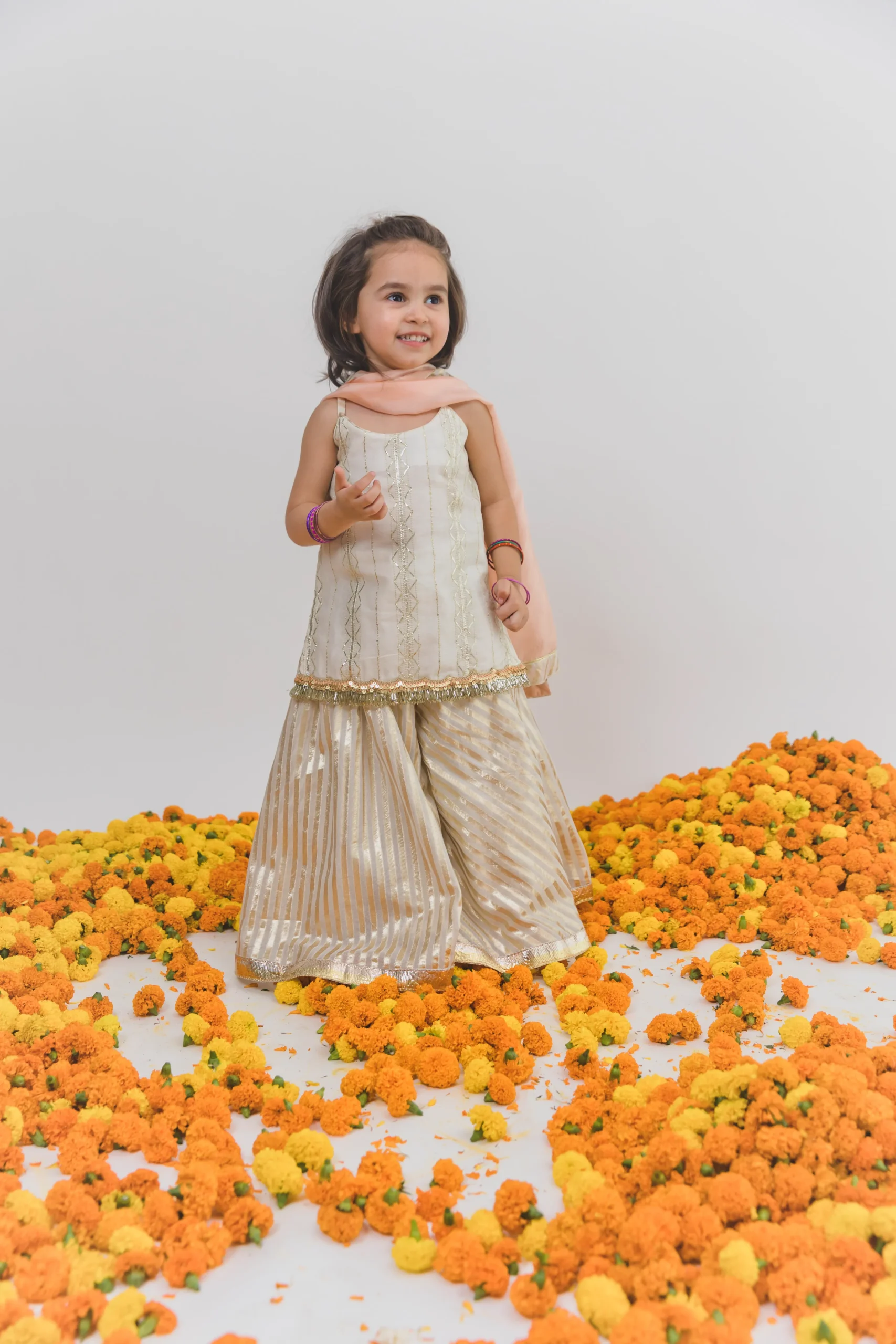 Embroidered Chanderi Kurta Sharara Set with Peach Dupatta from Golden Muslin By Choti Buti