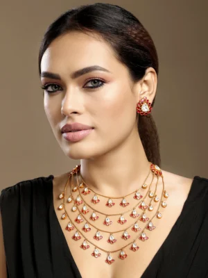 Red gold synthetic ruby Kundan Polki long necklace set with earrings from Golden Muslin By Hrisha