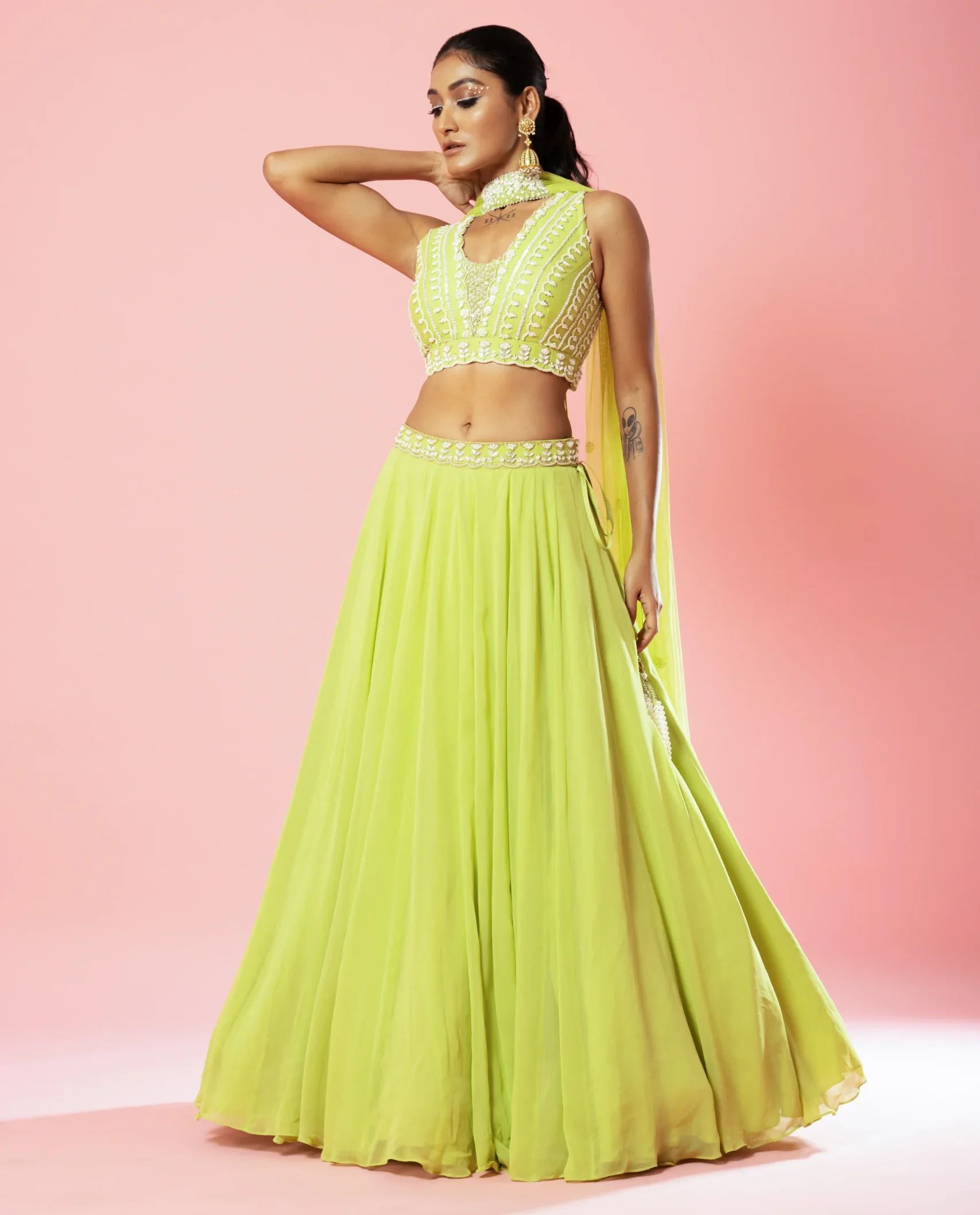 Lime Green Pure Georgette Lehenga with embroidered blouse, belt and choker dupatta from Golden Muslin By Quench A Thirst