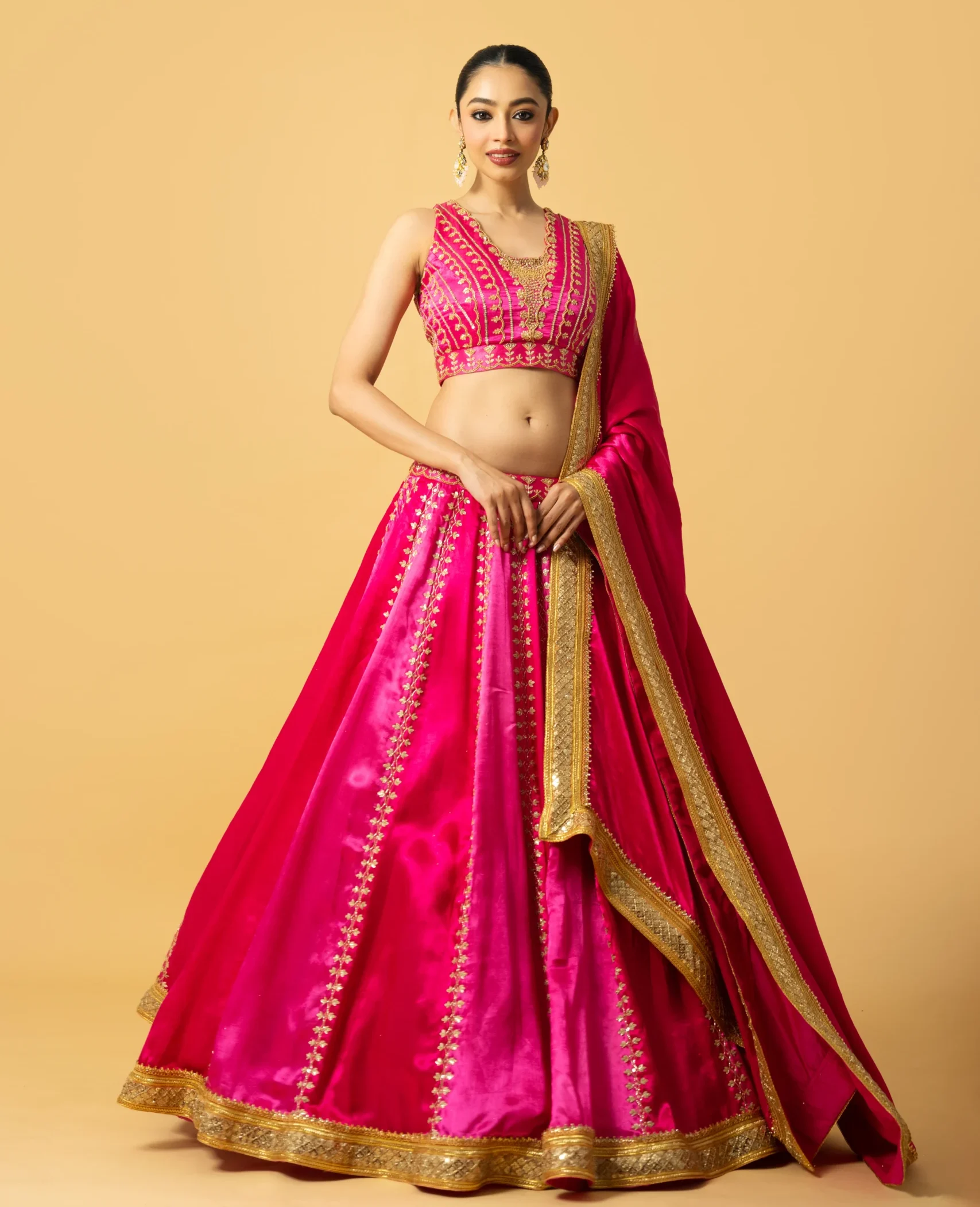 Pink Ombre Modal Satin Lehenga with cutdana and zari embroidery from Golden Muslin By Quench A Thirst