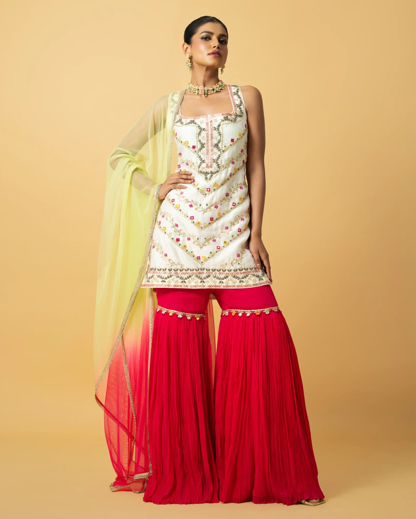Ivory Chanderi Silk Kurta with fuchsia sharara and embroidered detailing from Golden Muslin By Quench A Thirst