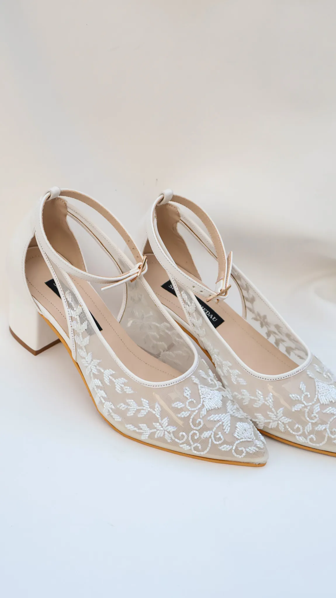 Aleena Collection White Mesh Heels from Golden Muslin By Shradha Hedau with floral detailing
