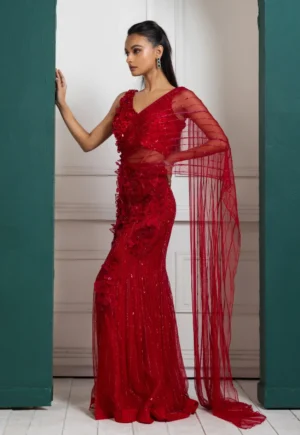 Red pre-stitched drape saree with floral embellished blouse and skirt base from Golden Muslin By Anuj Agarwal
