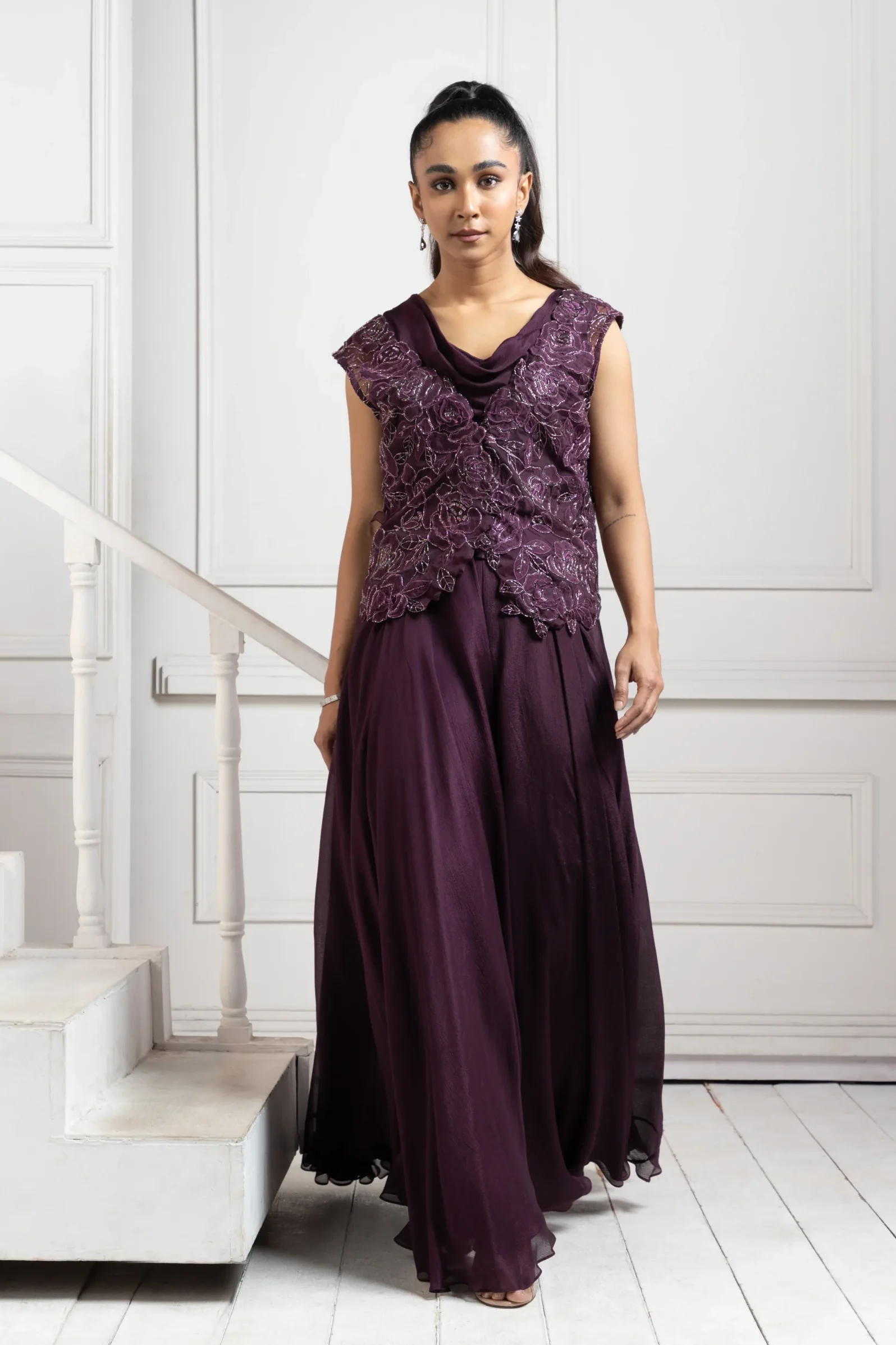 Deep plum embroidered co-ord set with floral applique bodice and wide-leg trousers from Golden Muslin By Anuj Agarwal