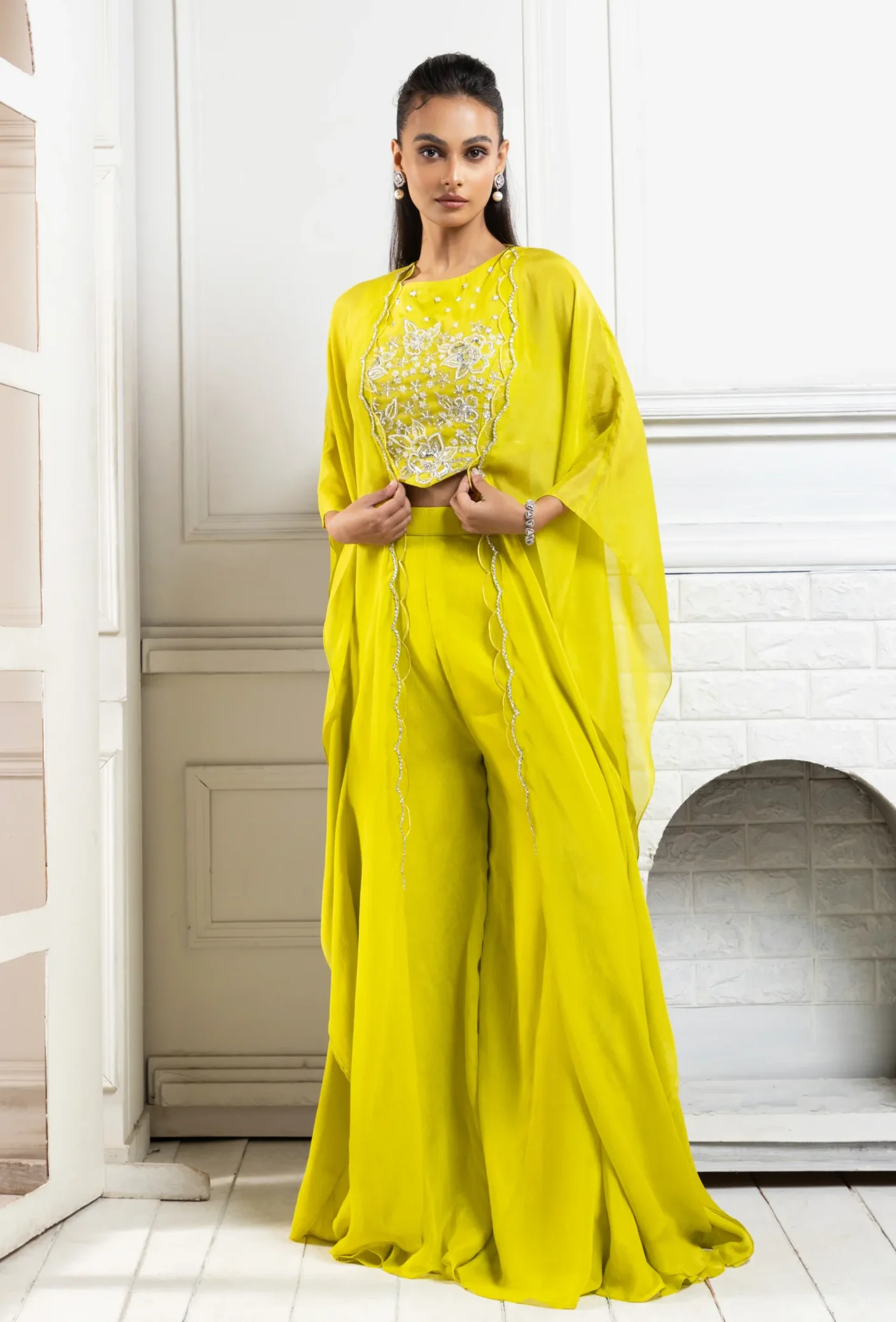 Chartreuse green embroidered cape palazzo set with crop top and flowing palazzo pants from Golden Muslin By Anuj Agarwal