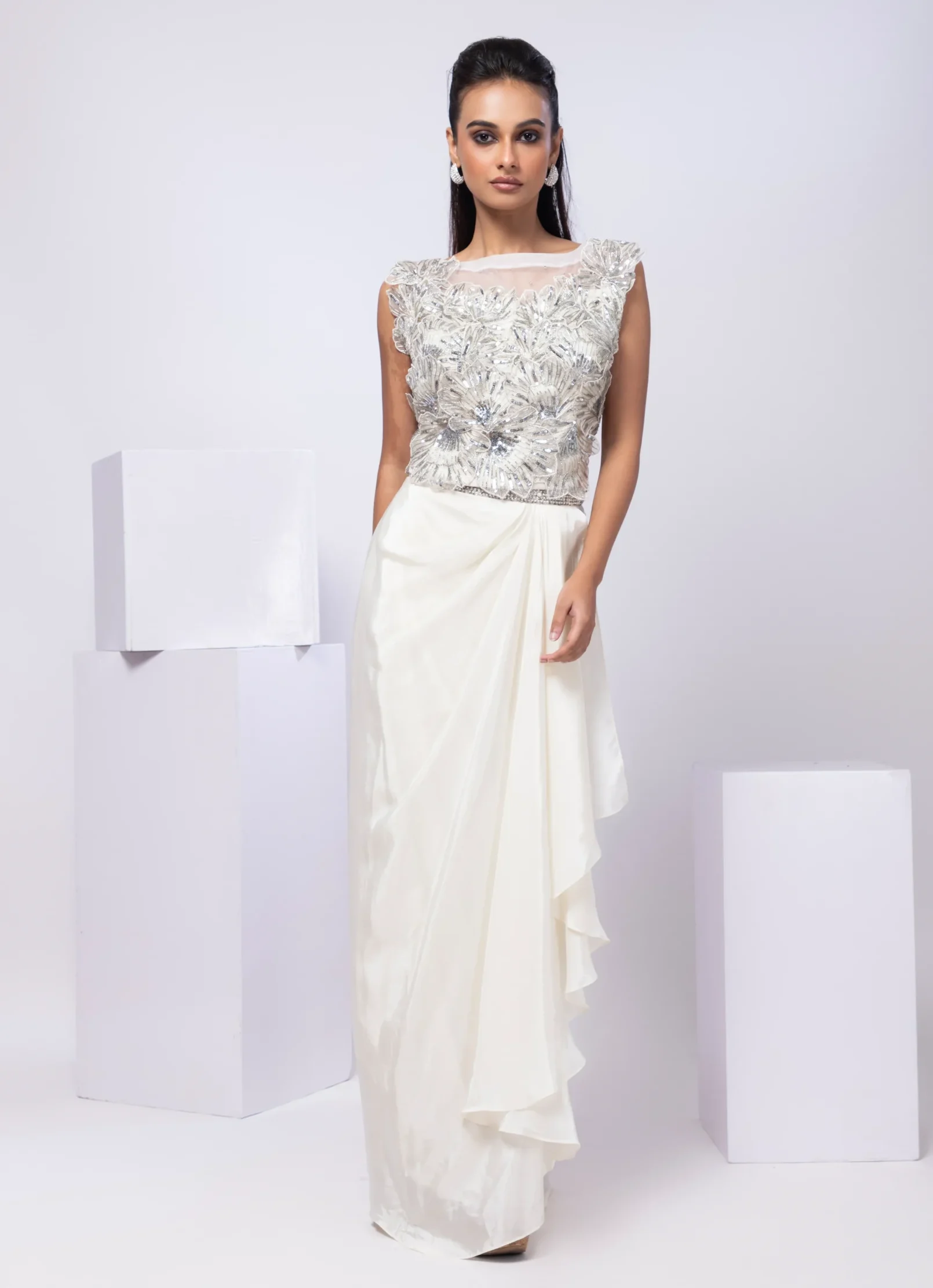 Ivory Shimmer Drape Skirt Set with 3D Floral Embroidery from Golden Muslin By Anuj Agarwal