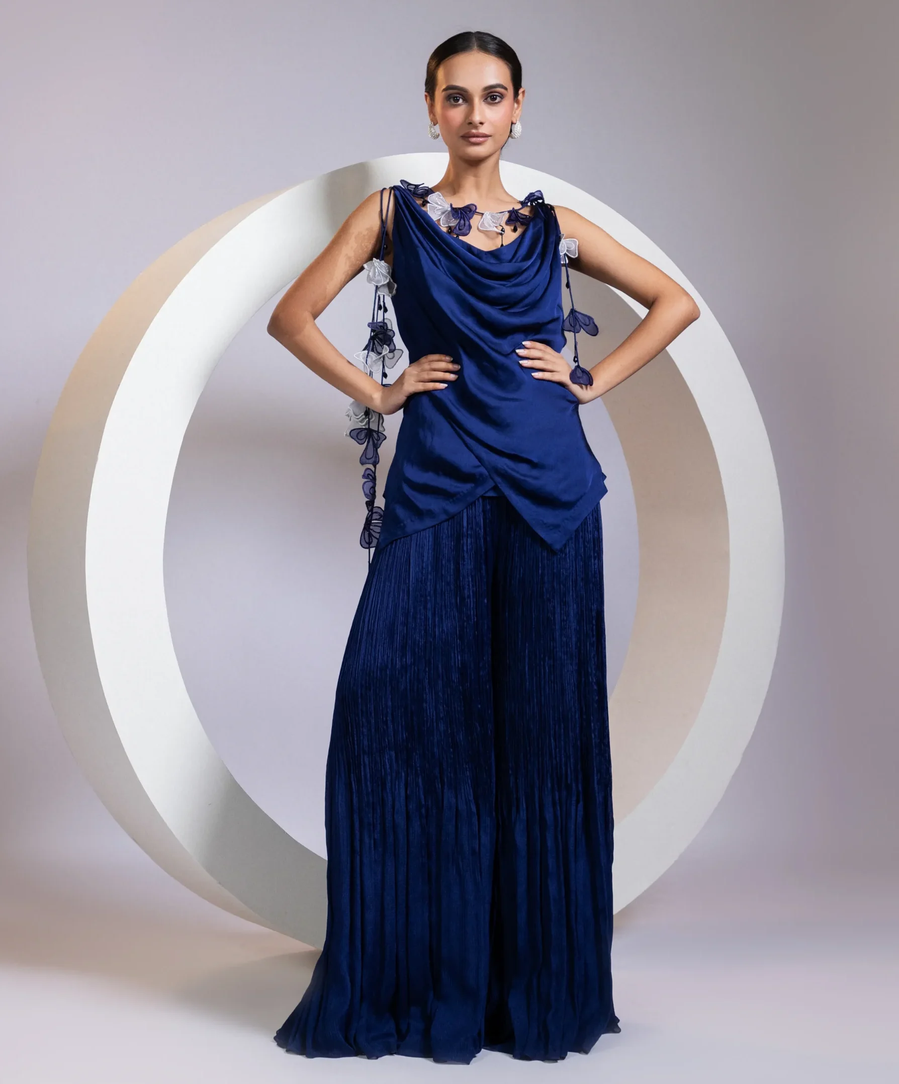 Midnight Navy Overlap Top and Ruched Palazzo Set with floral appliqué from Golden Muslin By Anuj Agarwal