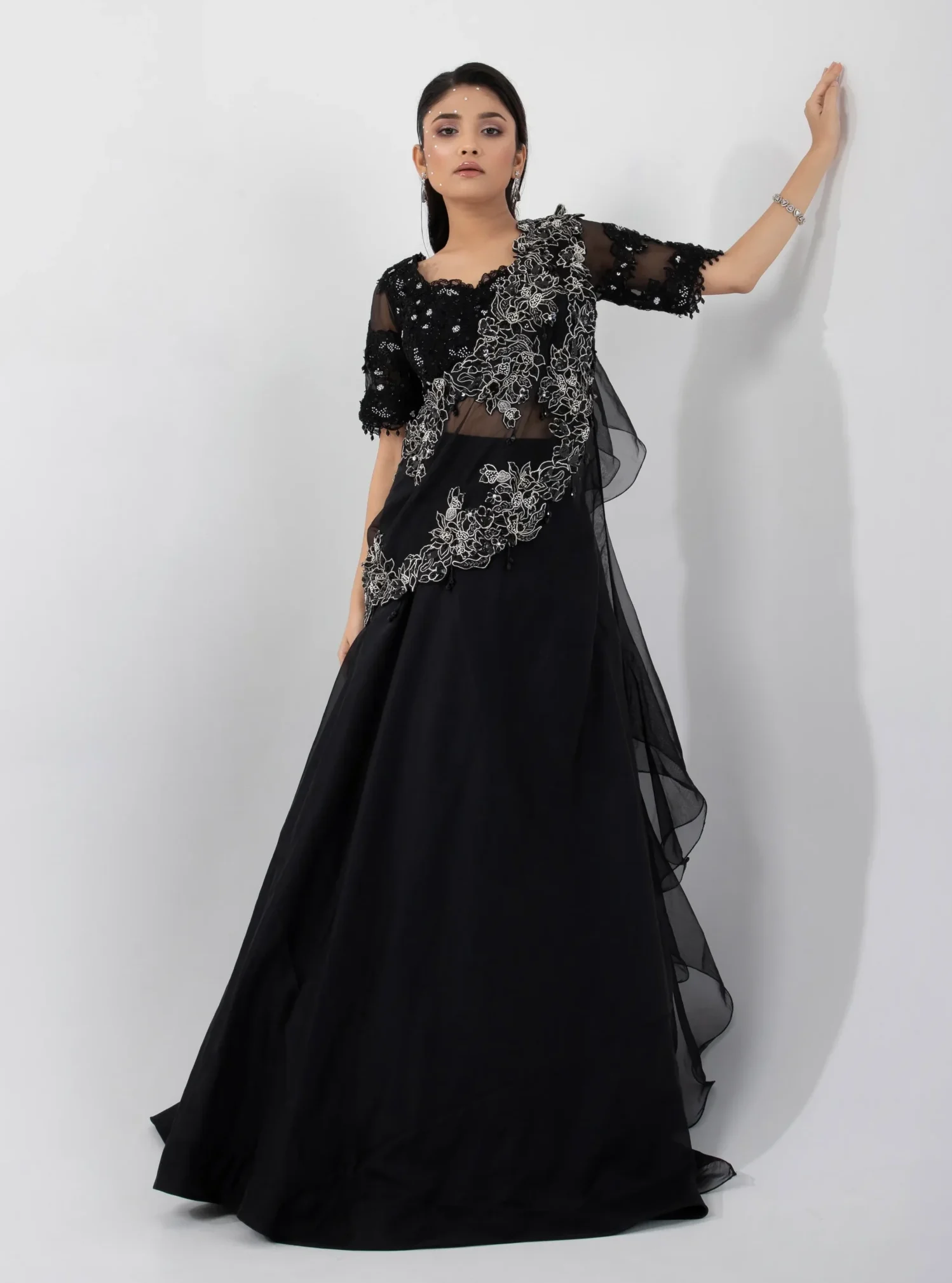 Black Chinon Lehenga Set with Ruffled Shoulder Drape and Embroidered Blouse from Golden Muslin By Anuj Agarwal