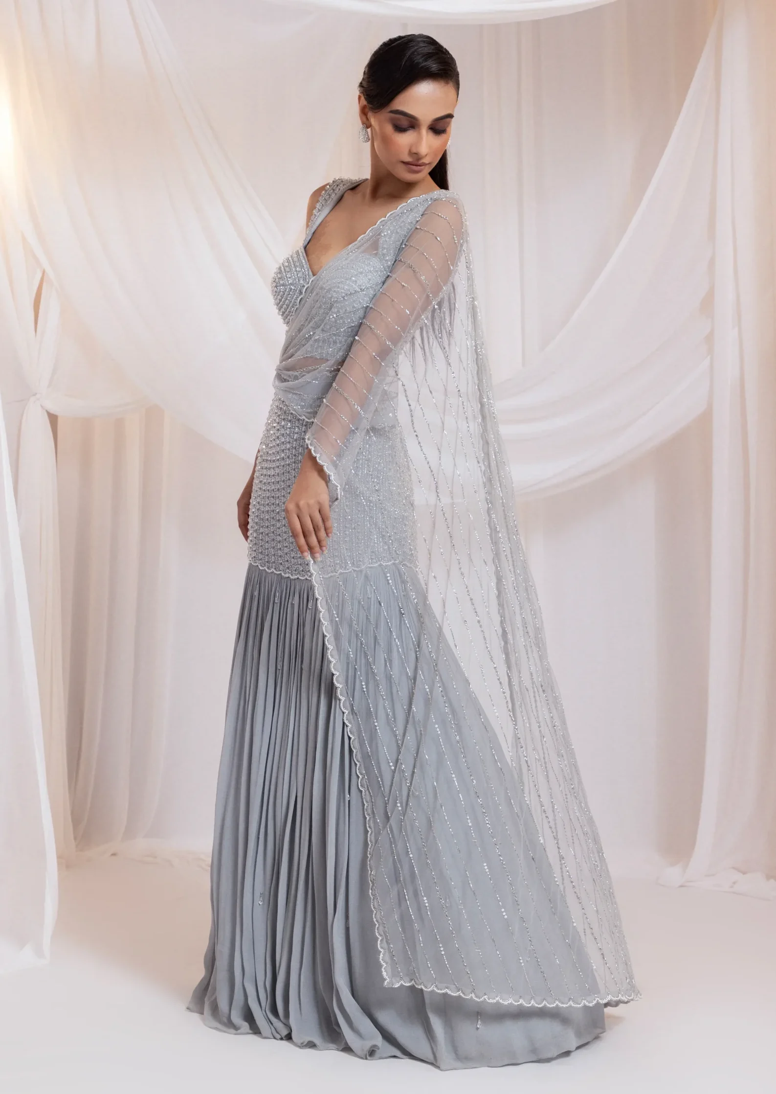 Golden Muslin Celeste Grey Crystal Embellished Drape Saree with beaded bodice and attached palla