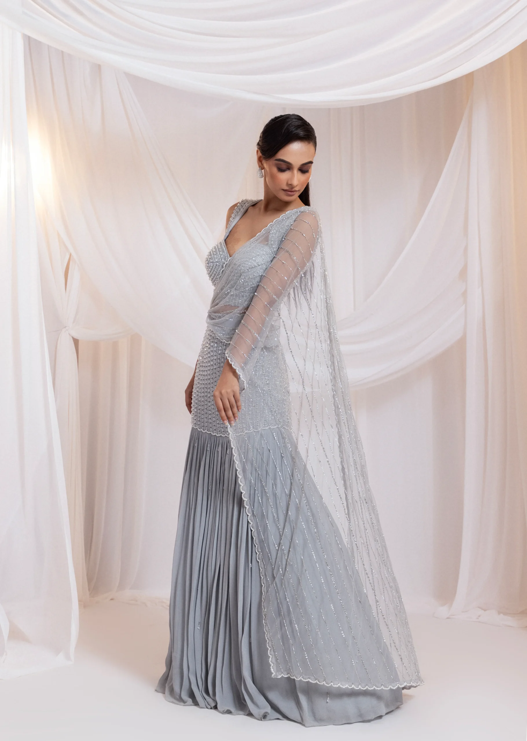 Golden Muslin Celeste Grey Crystal Embellished Drape Saree with beaded bodice and attached palla