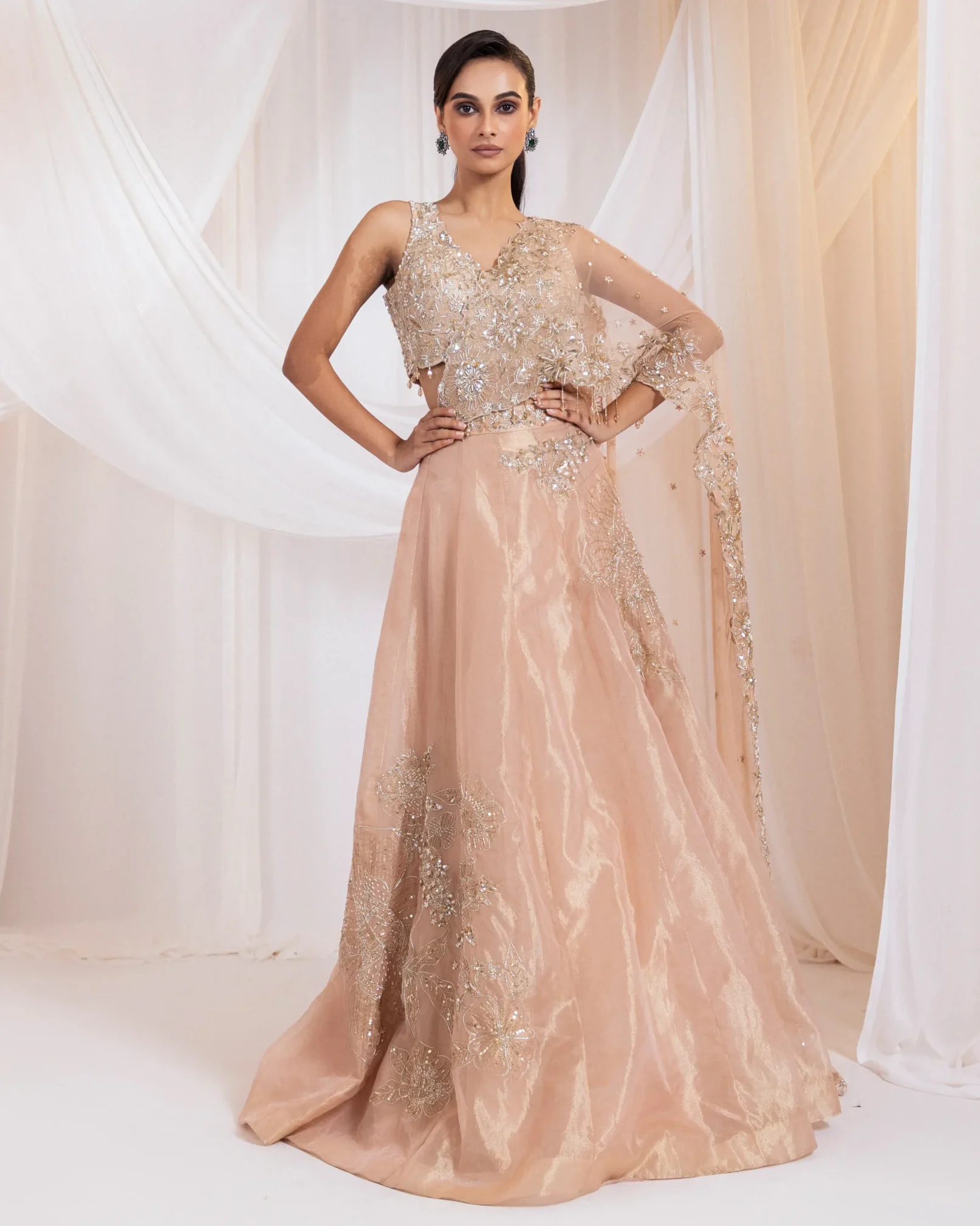 Black drape saree with floral cutdana embroidery and crystal detailing from Golden Muslin By Anuj Agarwal