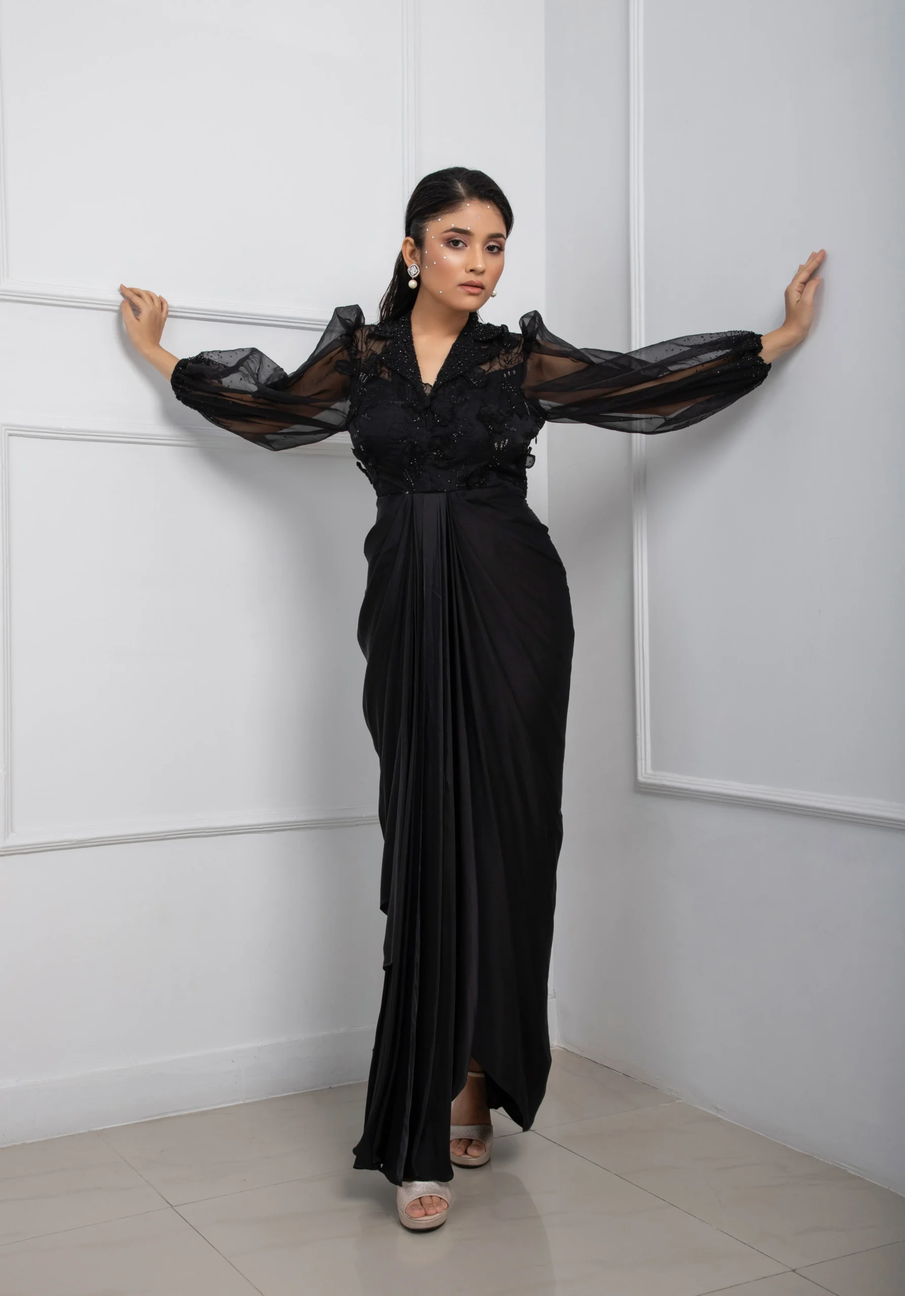 Black Draped Modal Satin Gown with Organza Floral Applique and Balloon Sleeves from Golden Muslin By Anuj Agarwal