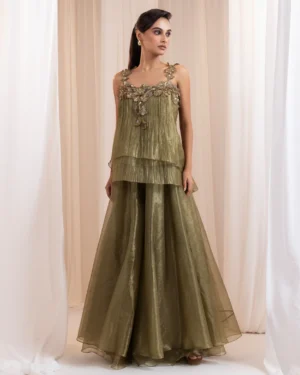Antique olive green peplum top with 3D floral appliqués and flared pants from Golden Muslin By Anuj Agarwal