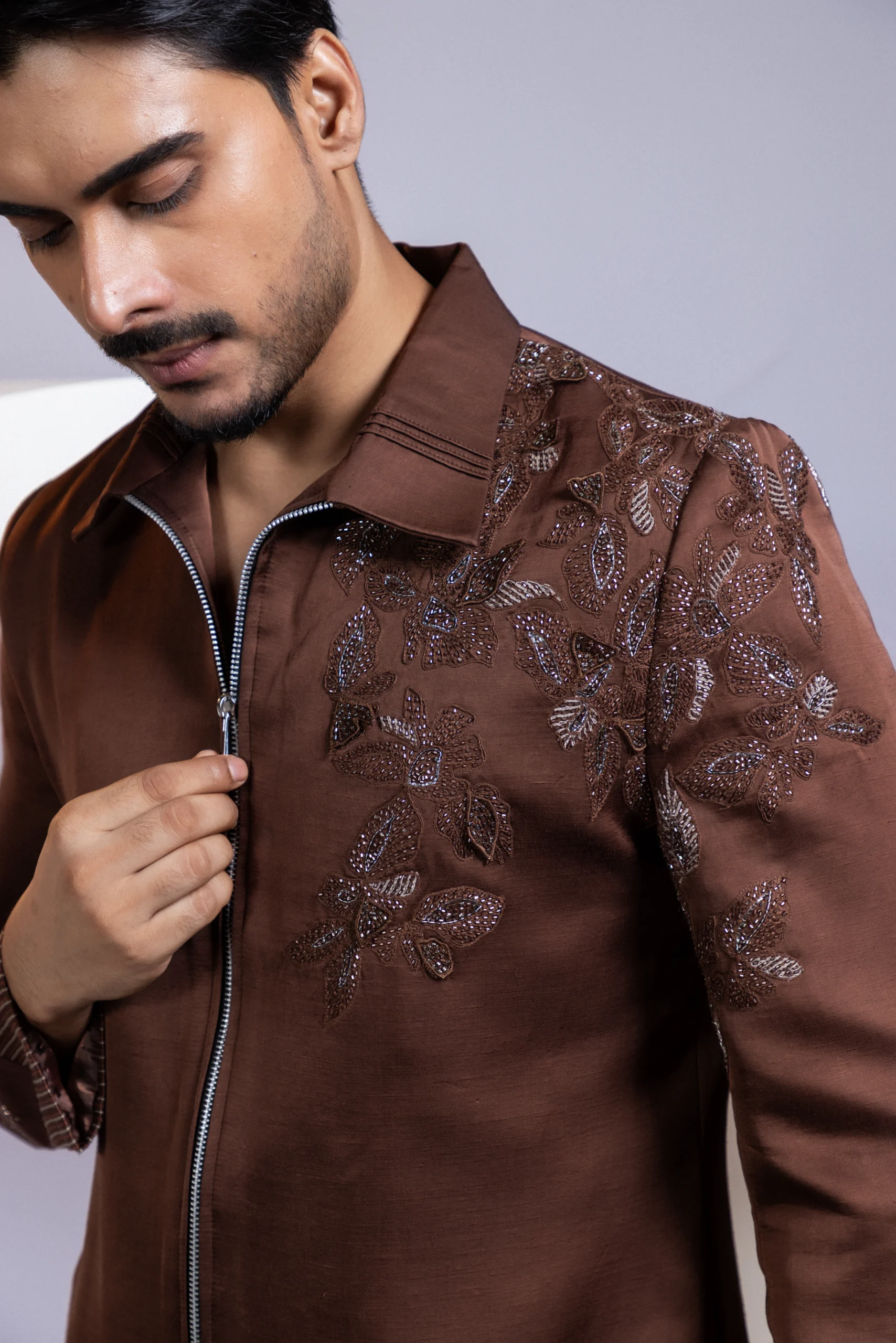 Cocoa Brown Bomber Jacket with Floral Embroidery and 3D Applique from Golden Muslin By Anuj Agarwal