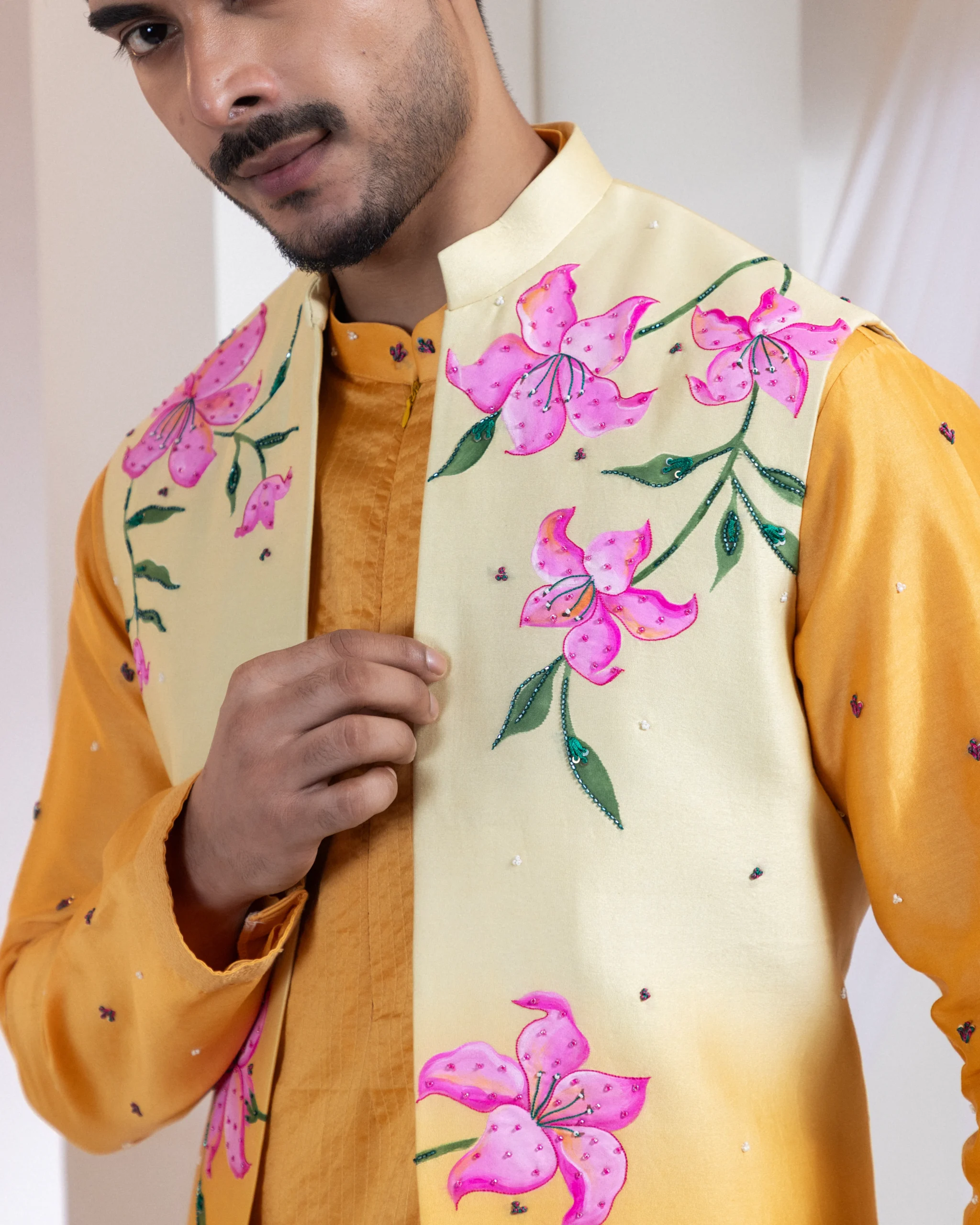 Mustard yellow ombre hand-painted Nehru jacket with bead embroidery from Golden Muslin By Anuj Agarwal