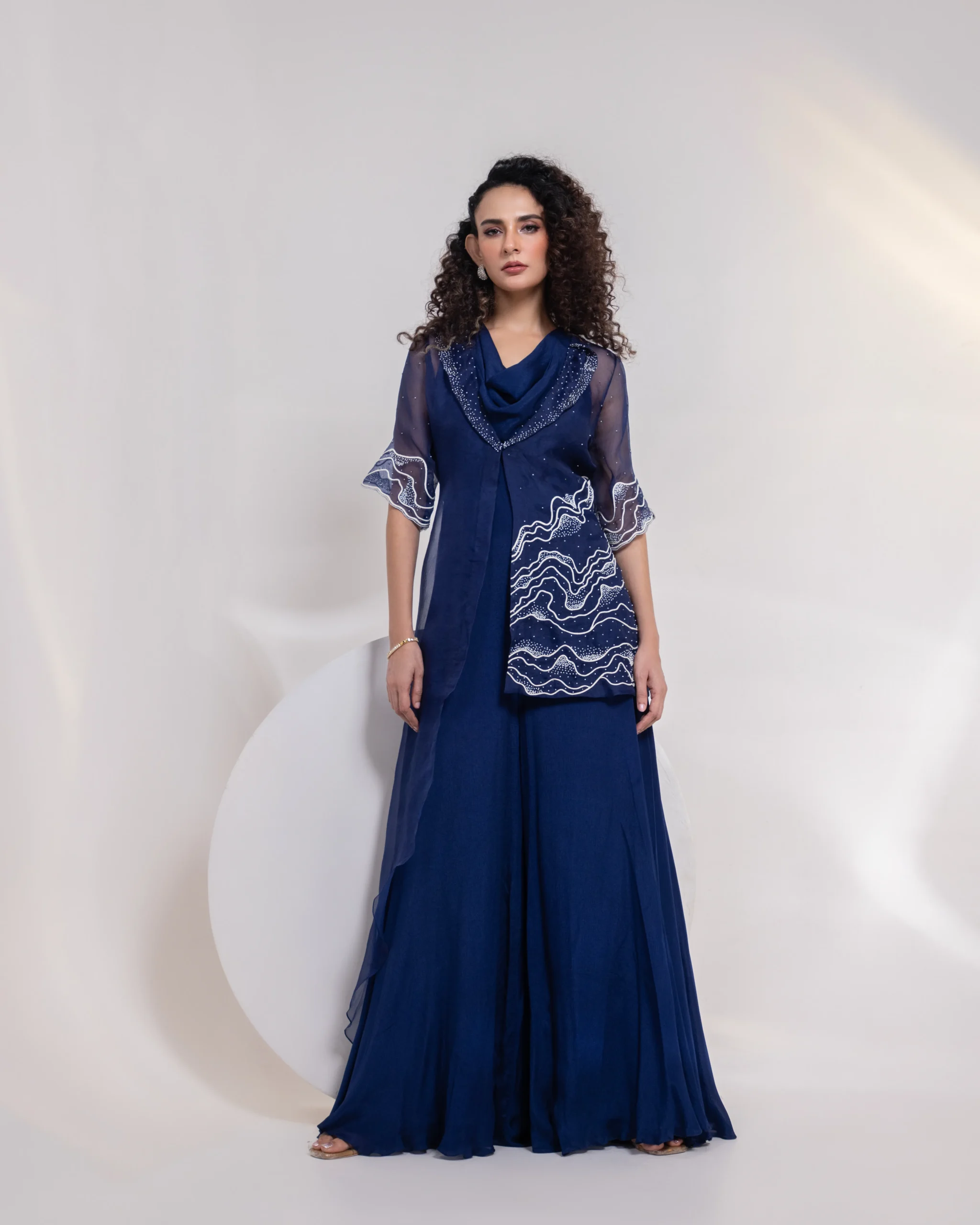 Royal Blue Jumpsuit with Cowl Neckline and Sheer Embellished Overlay from Golden Muslin By Anuj Agarwal