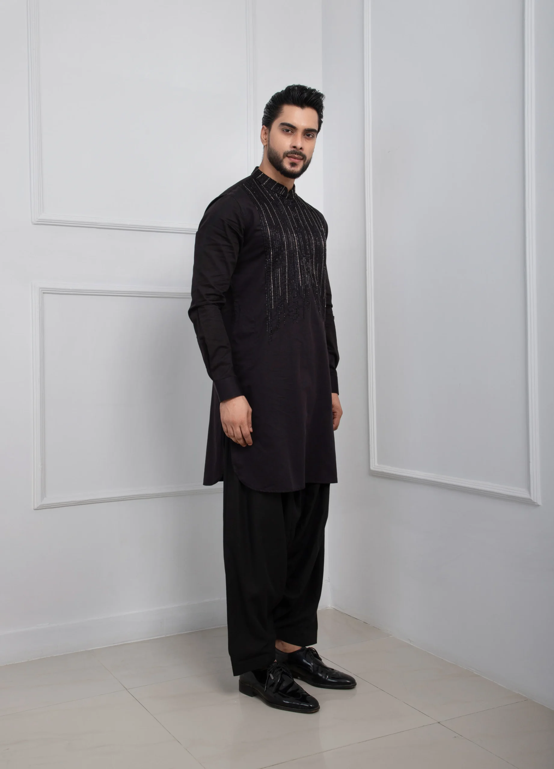 Black Embroidered Pathani Kurta Set with Patiala Salwar from Golden Muslin By Anuj Agarwal