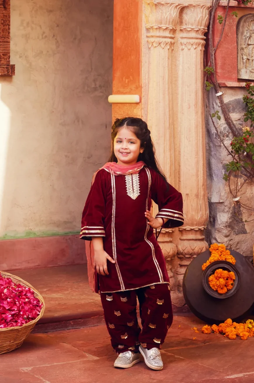 Elegant Maroon Velvet Kurta Set with Salwar and Dupatta from Golden Muslin By Choti Buti