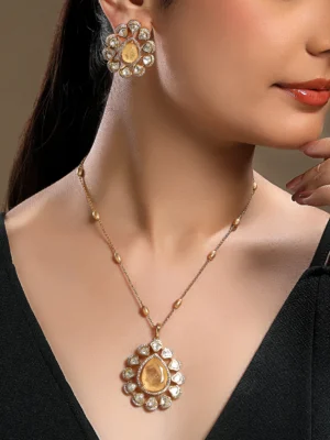 Peach Agate Kundan Polki pendant long necklace set with pearl accents in micron gold polished brass from Golden Muslin By Hrisha
