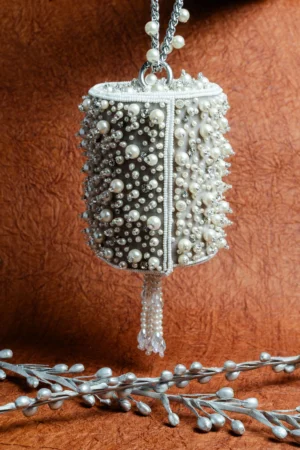 Ivory Cylindrical Clutch with Diamantes and Intricate Pearl Work